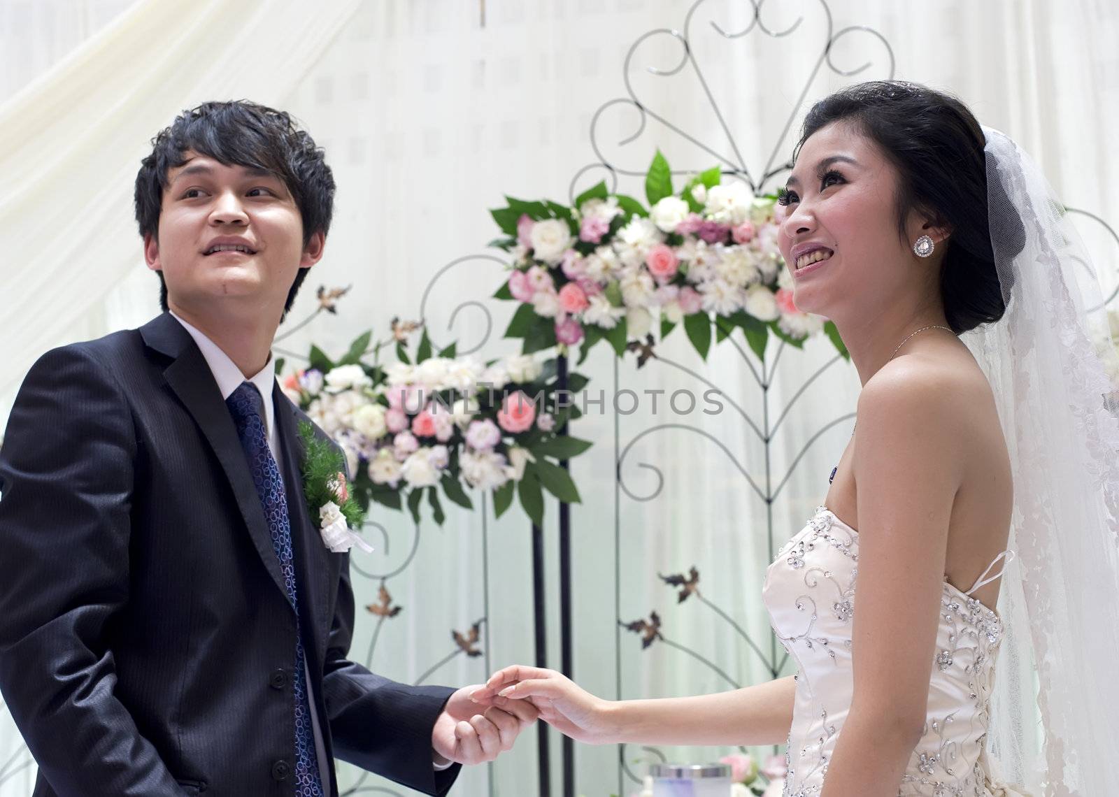 a young couple on their wedding day