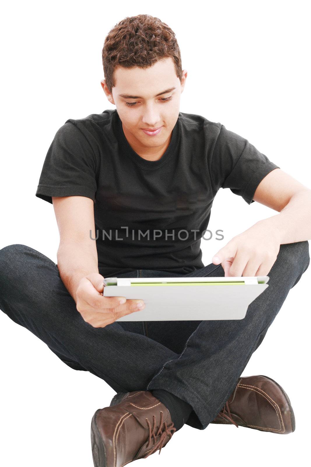 Young man using a touch pad PC, isolated on white