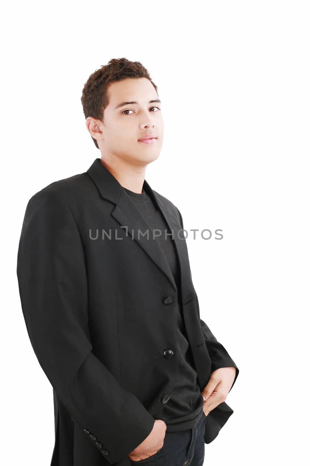 Happy smiling young man standing isolated on white background