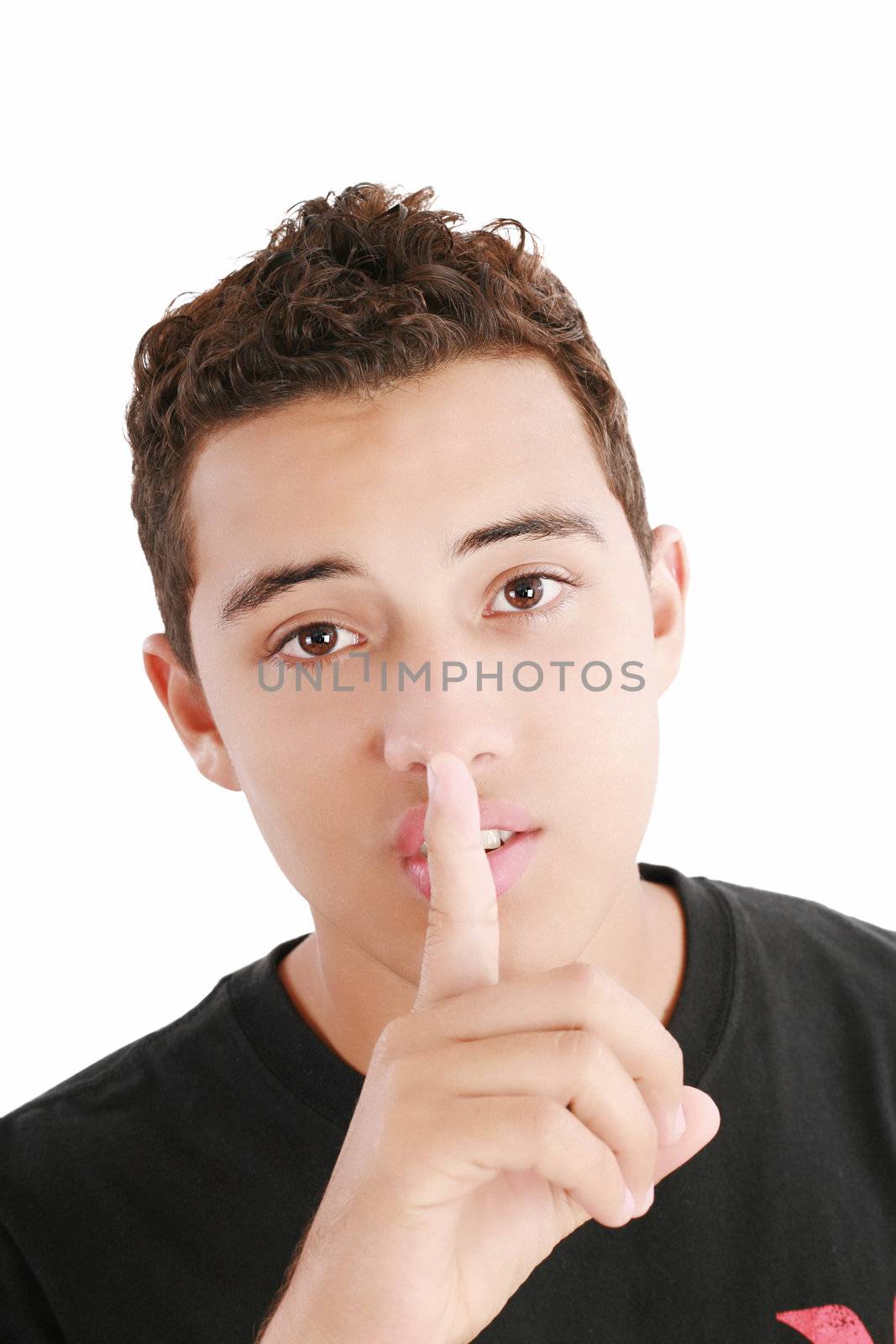 young man with finger on his mouth isolated over white backgroun by dacasdo