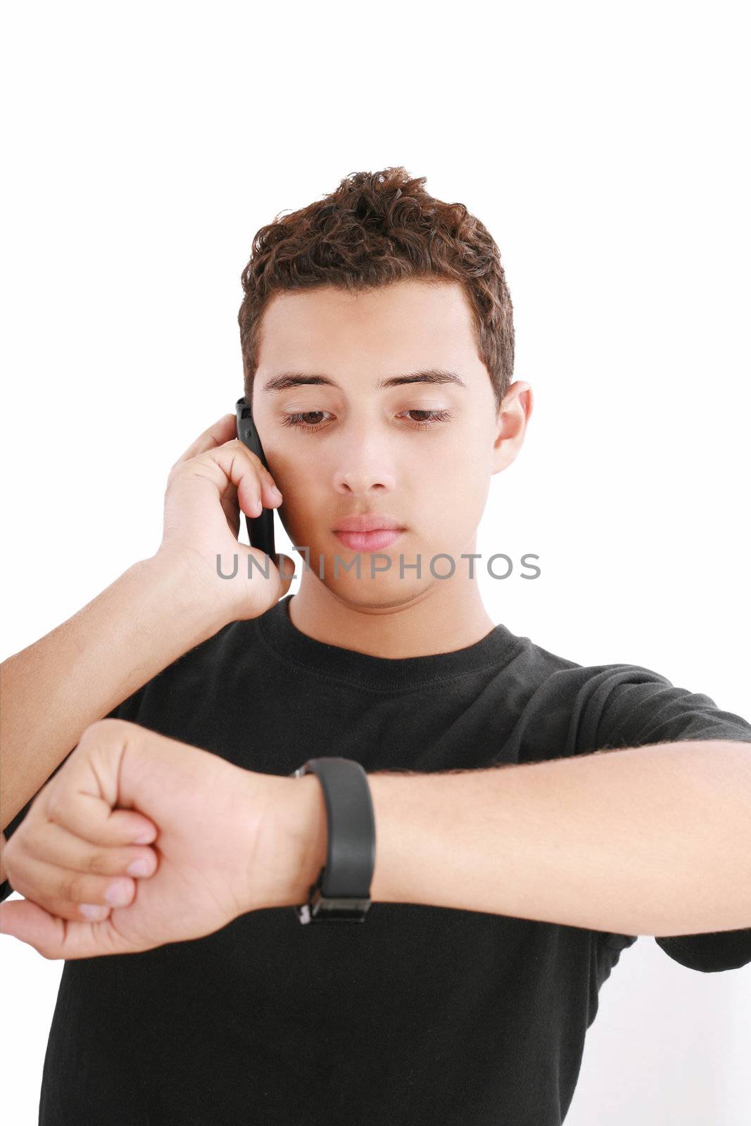 Portrait of a busy young male using mobile phone and looking at by dacasdo