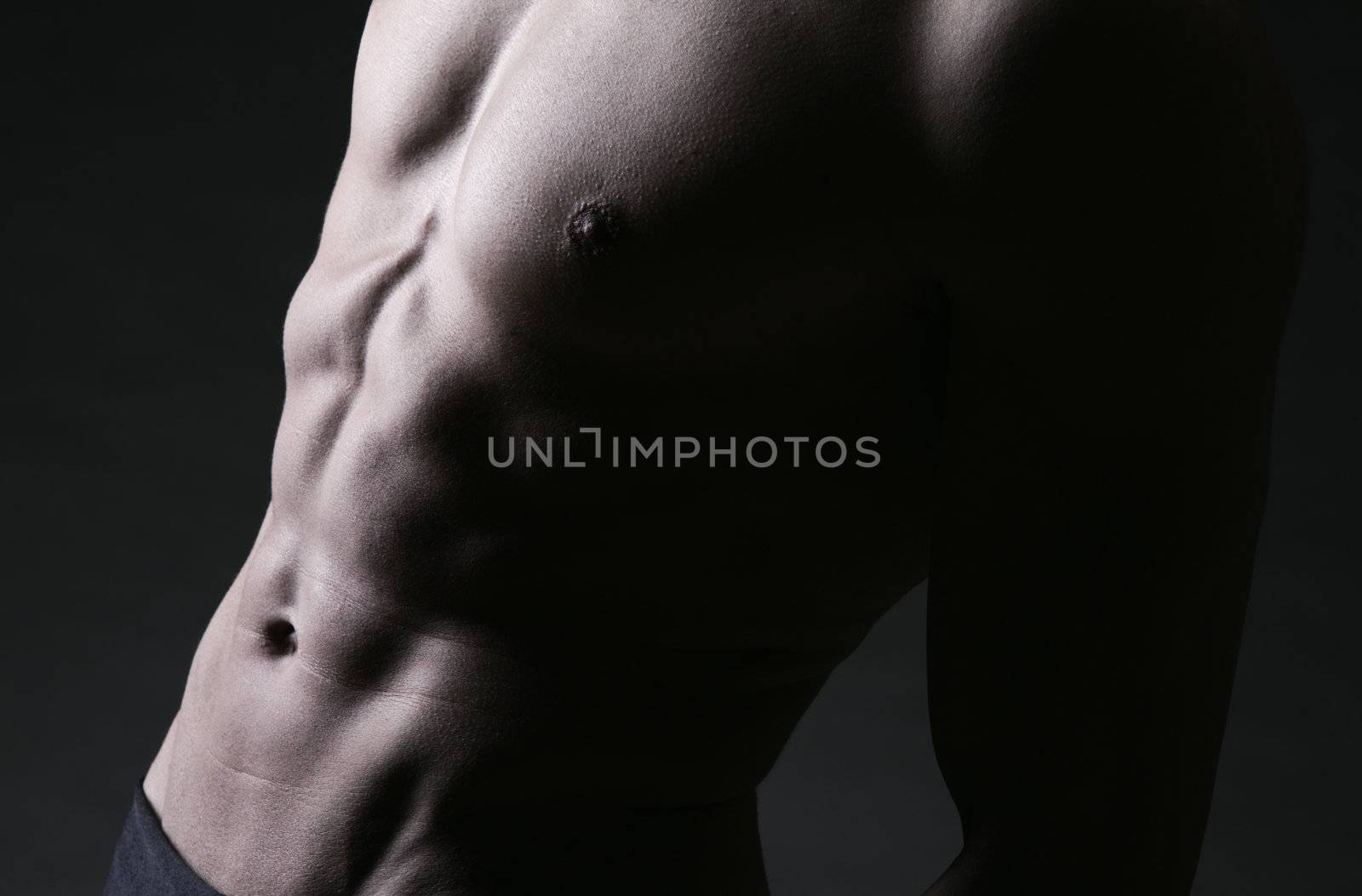 Closeup of abdomen muscles, Male Athlete