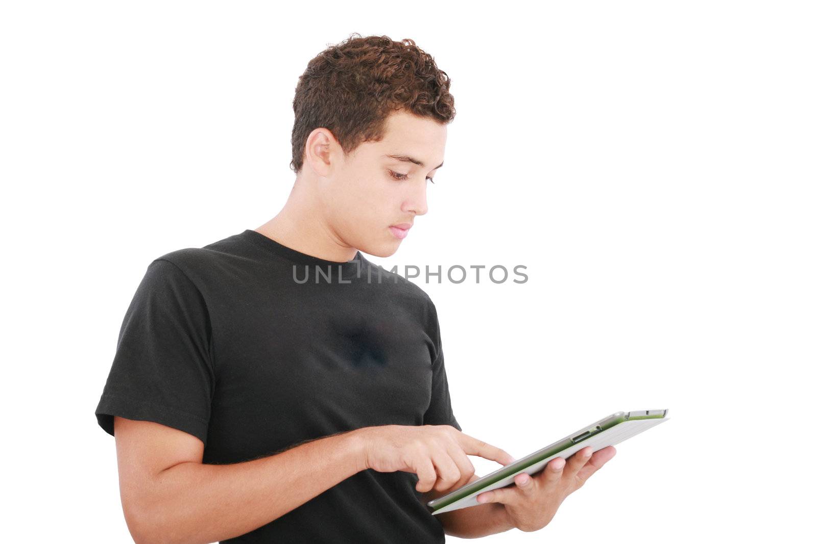 Young casual student working on a digital tablet. Isolated on a white background