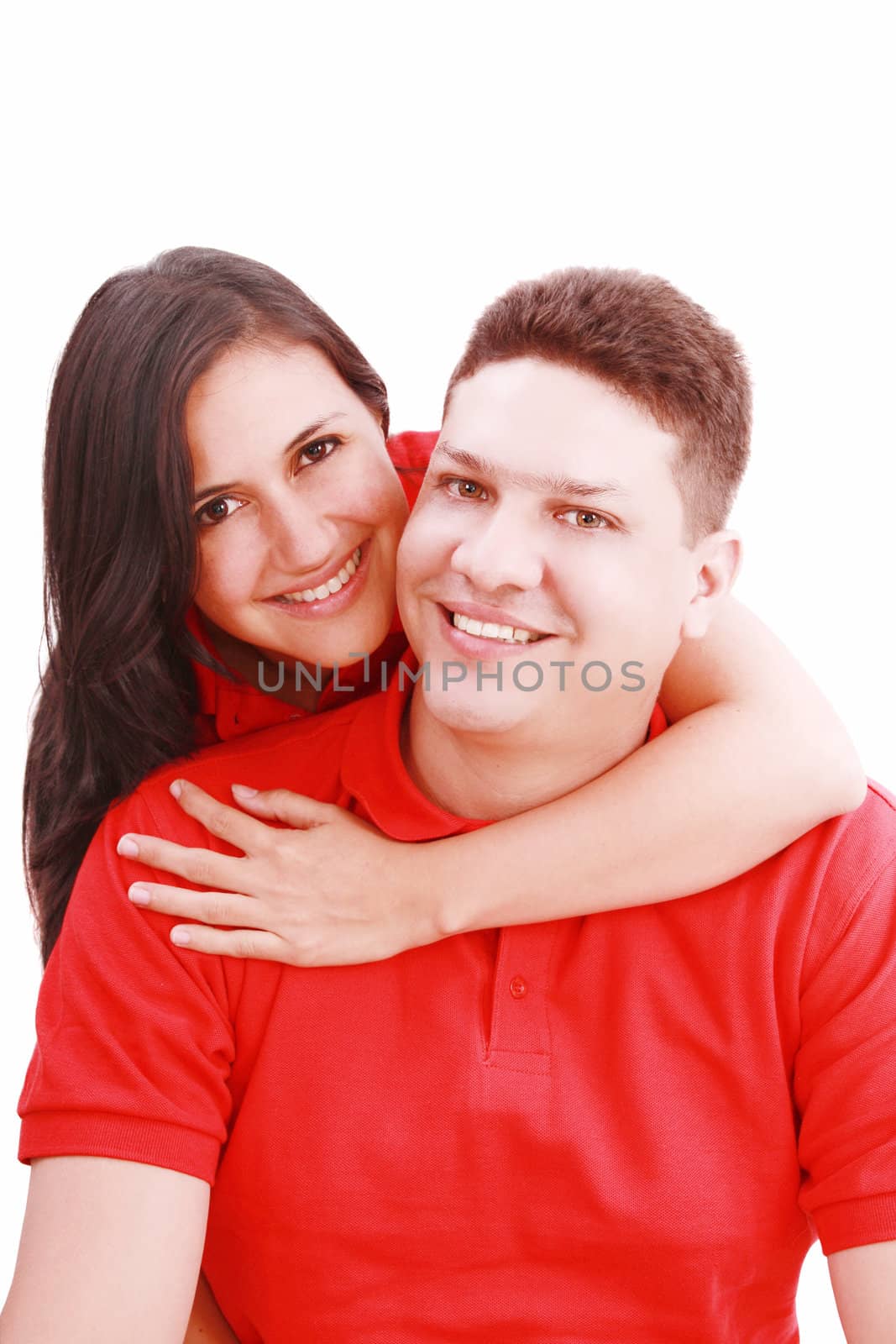 Young couple staring at you isolated on white