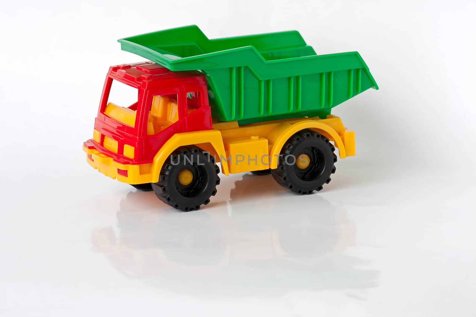 Two toy car on  white background. It's trucks.