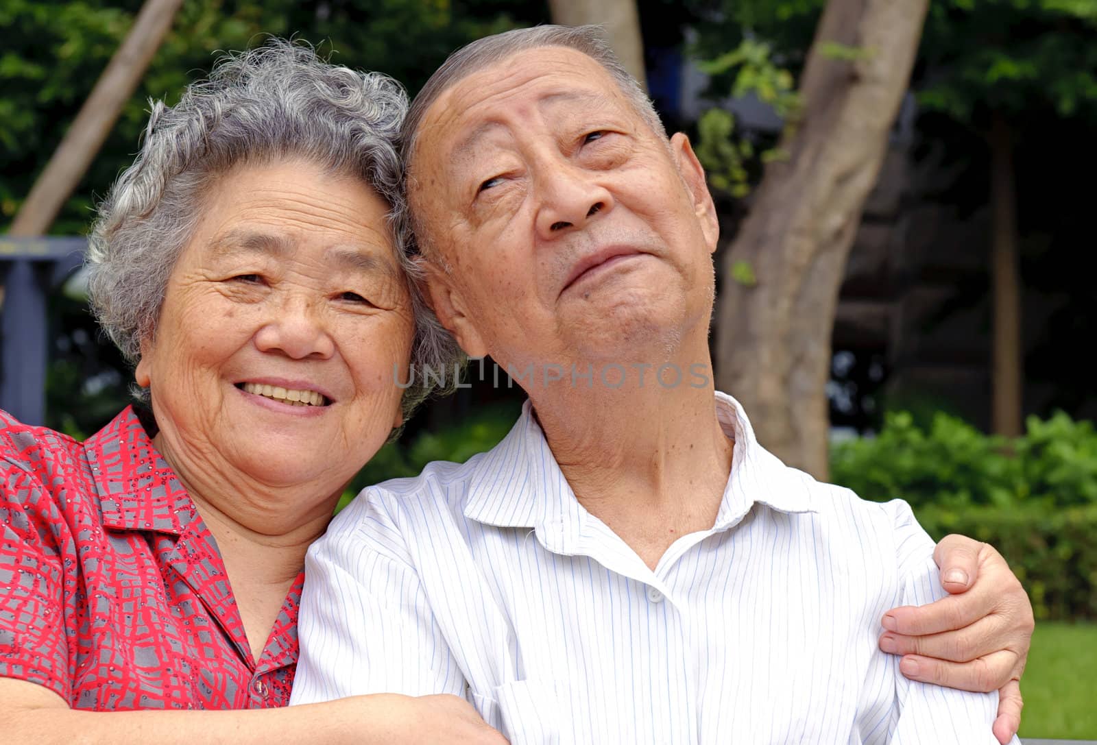 happy senior couple embraced