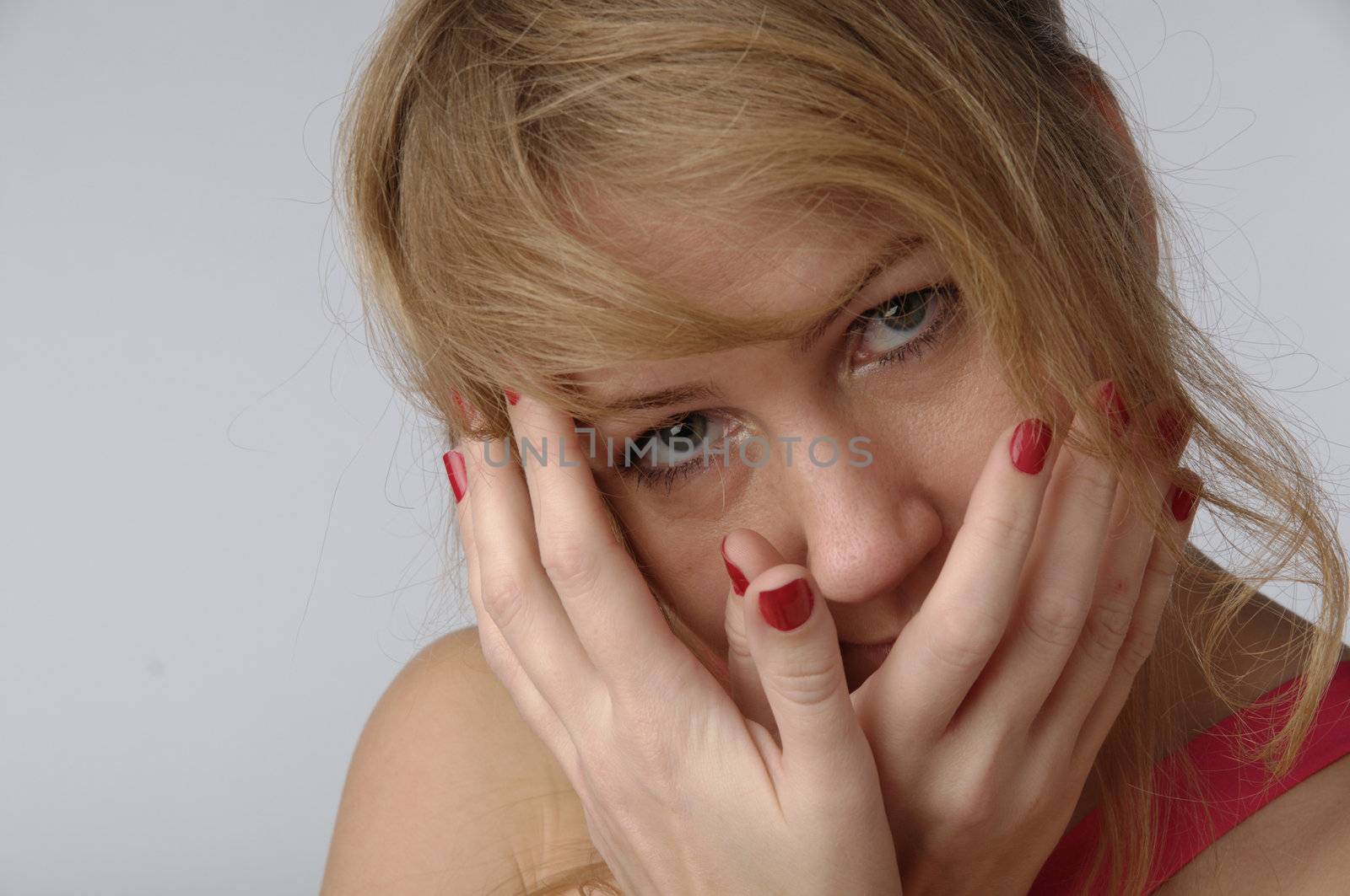 Portrait of the young and beautiful girl which the head is ill