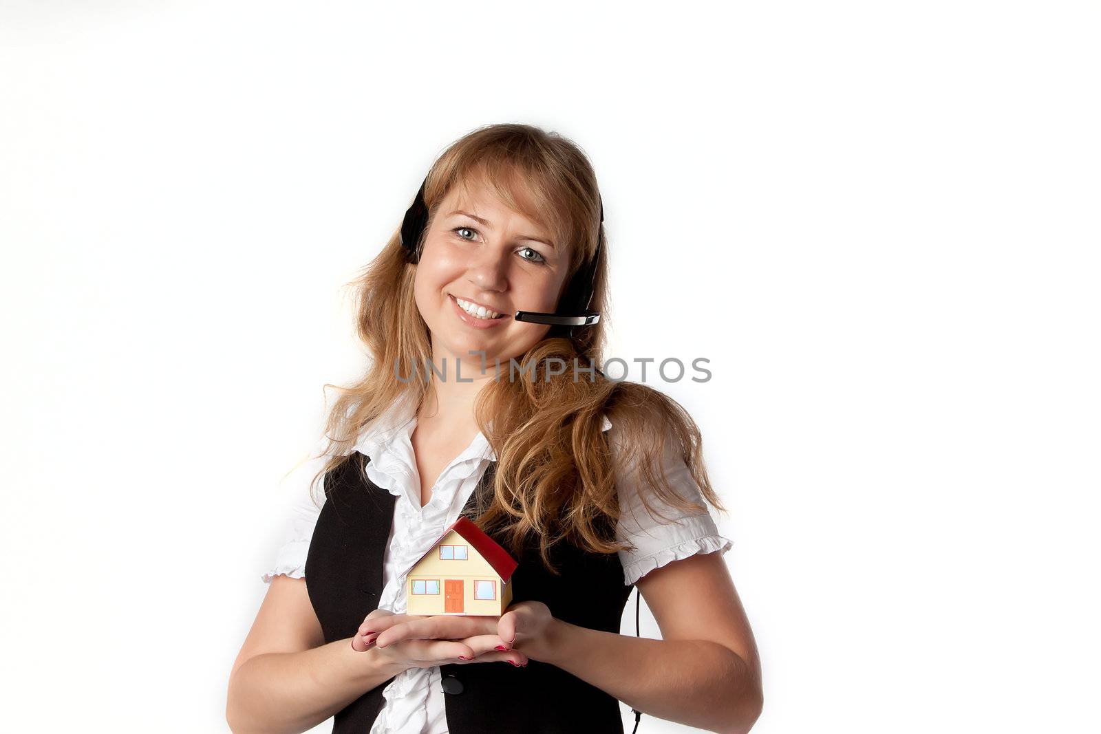 Little House in the hands of young and beautiful business woman