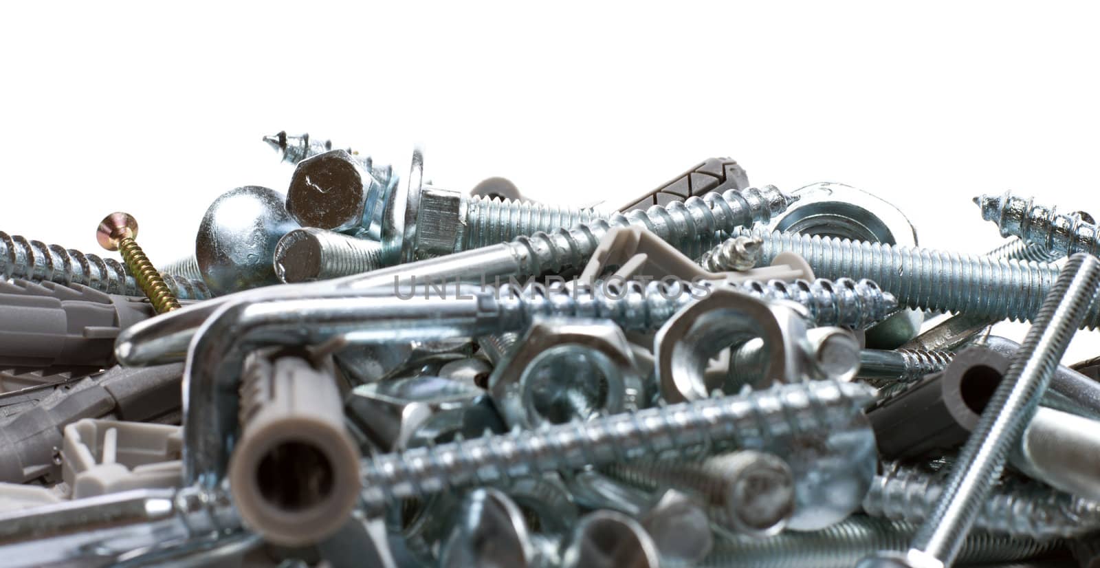 bolts, nuts, washers, as a background close up