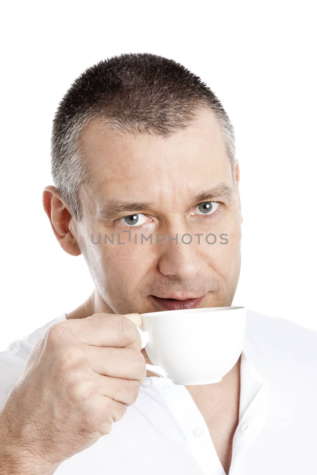 A handsome man with a cup of coffee