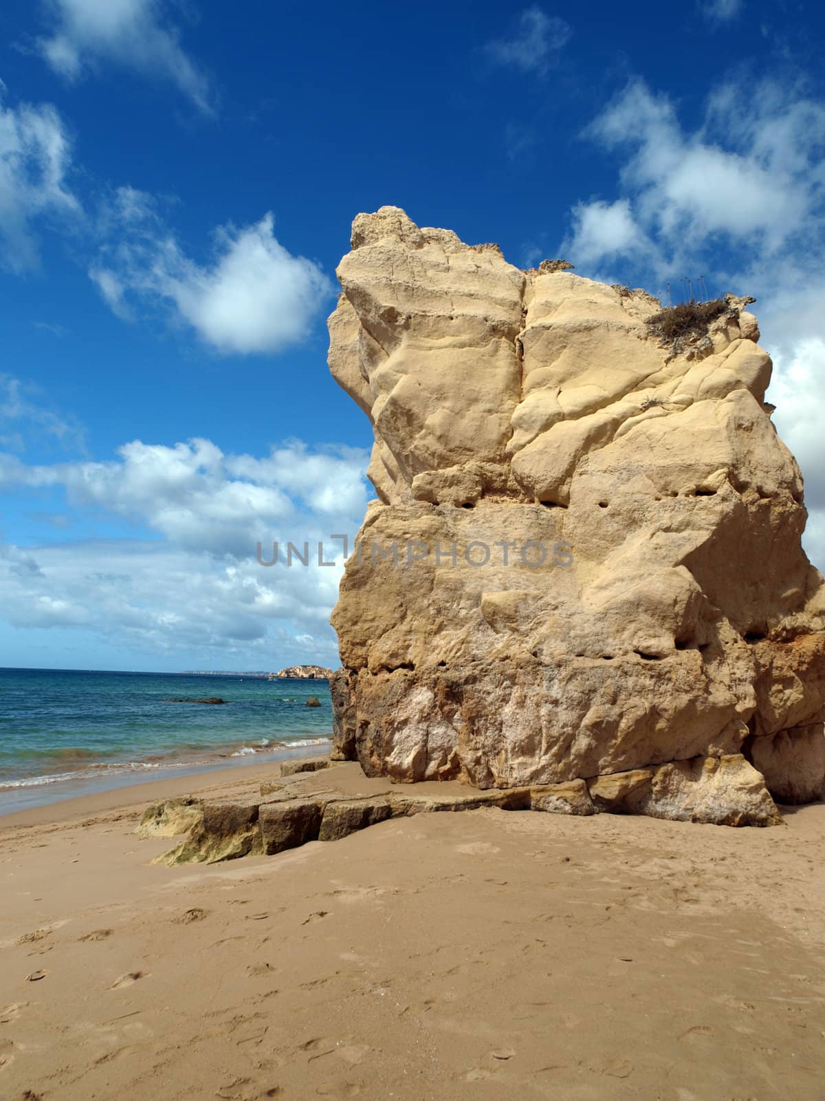 A section of the idyllic Praia de Rocha beach on the southern coast of the Portuguese Algarve region.