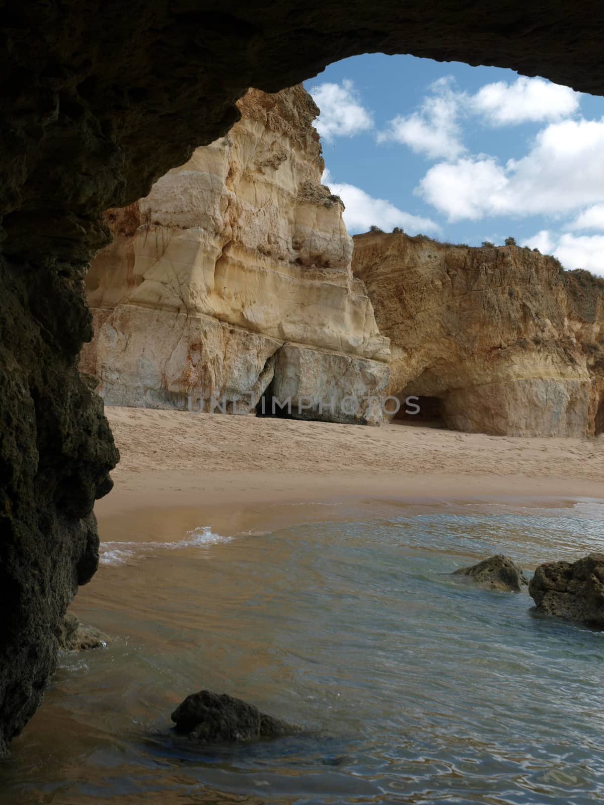 A section of the idyllic Praia de Rocha beach on the southern coast of the Portuguese Algarve region.