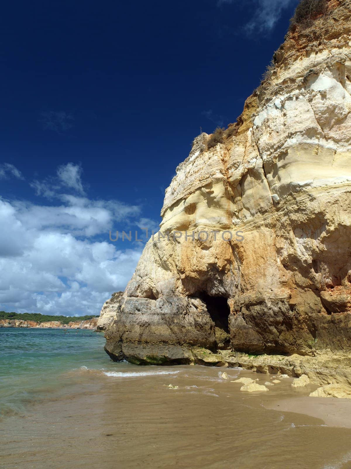 A section of the idyllic Praia de Rocha beach on the southern coast of the Portuguese Algarve region.