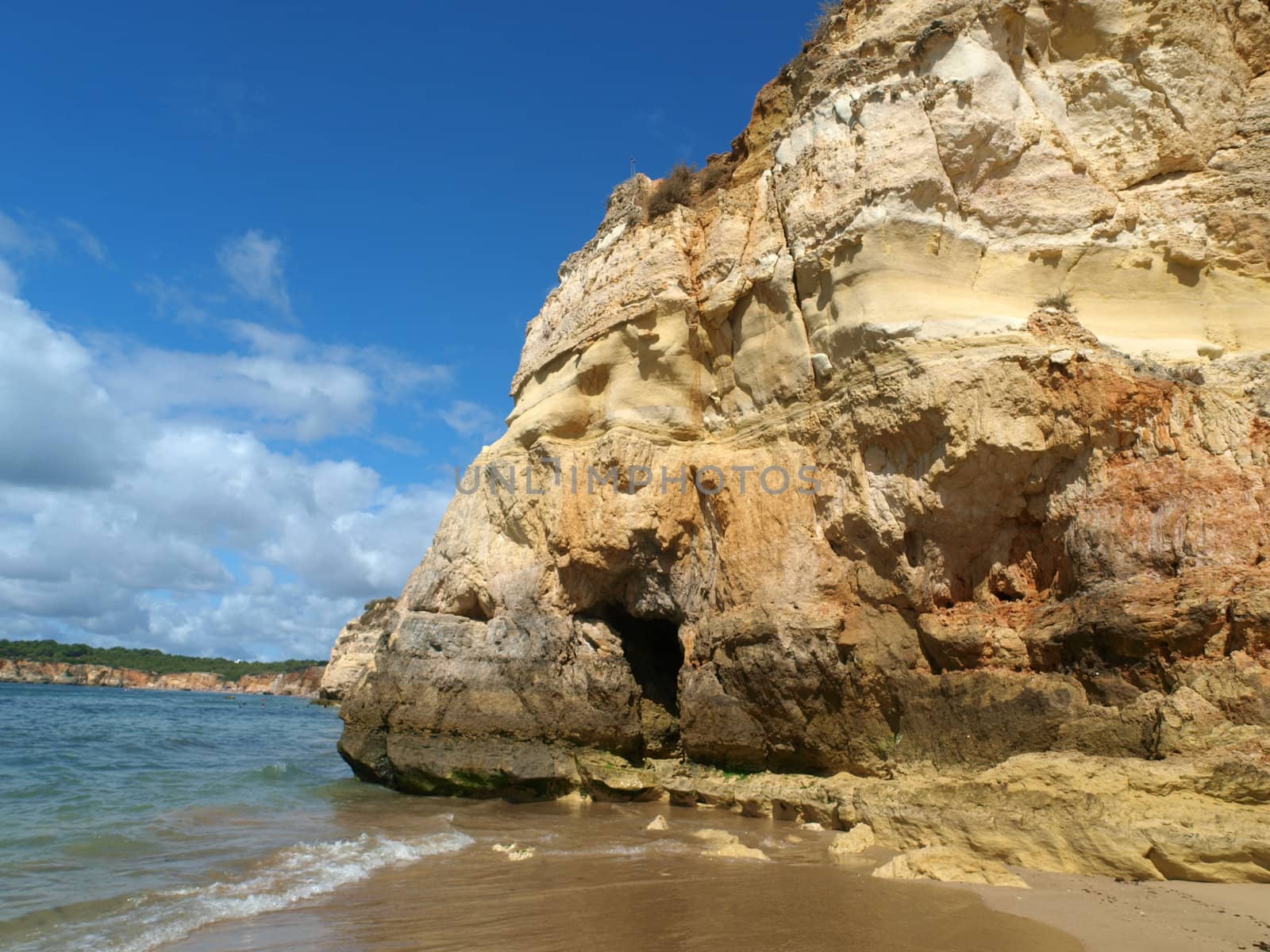 A section of the idyllic Praia de Rocha beach on the southern coast of the Portuguese Algarve region.