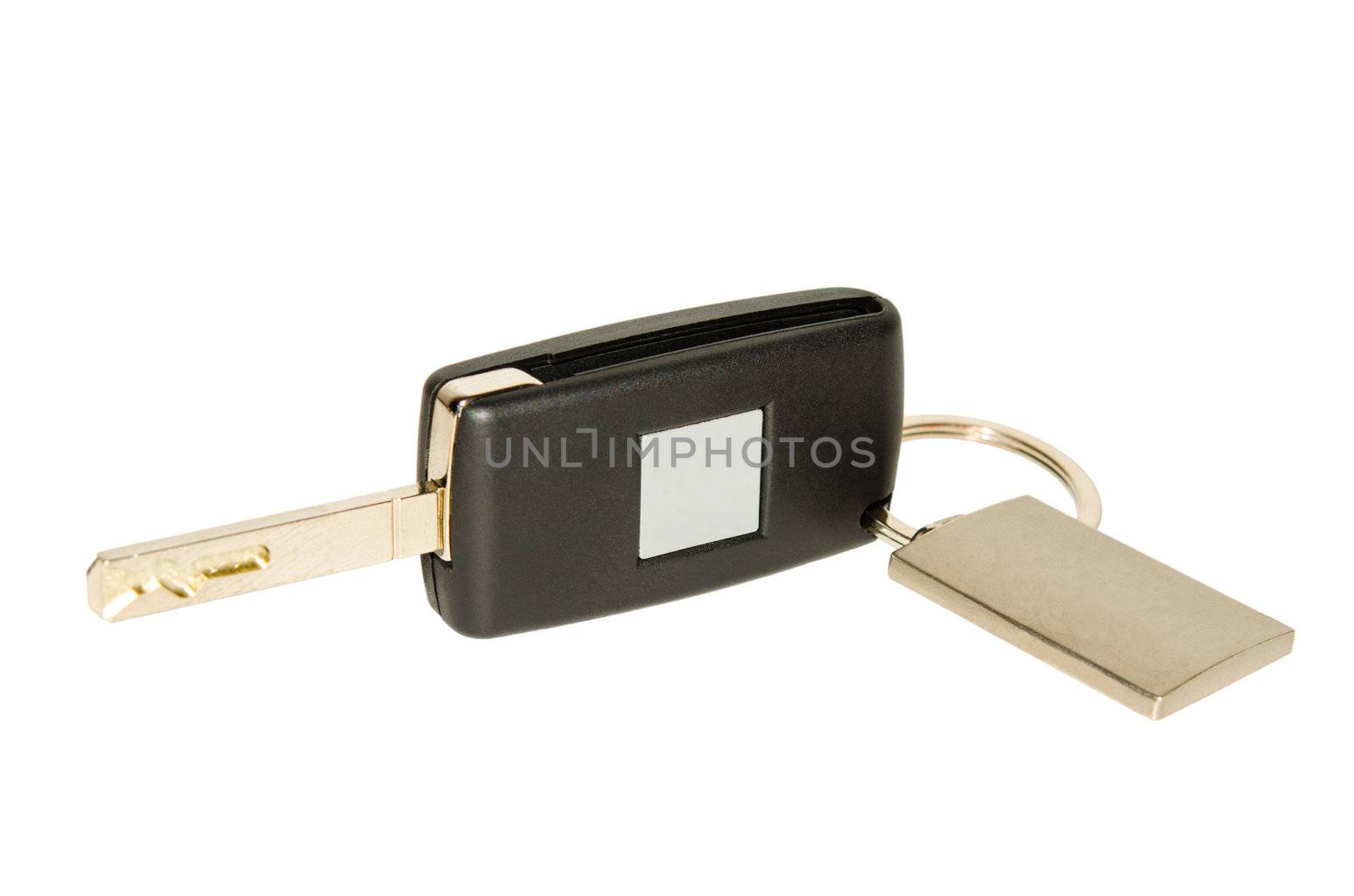 Isolated on white folding automobile key with blank plate nameplate and keychain