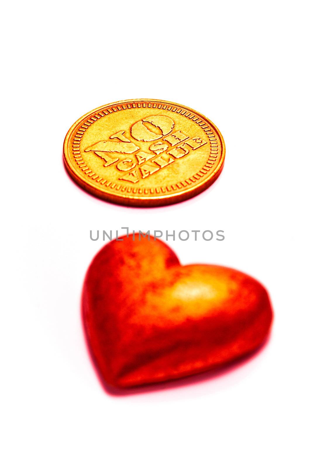 Coin and Heart isolated on white