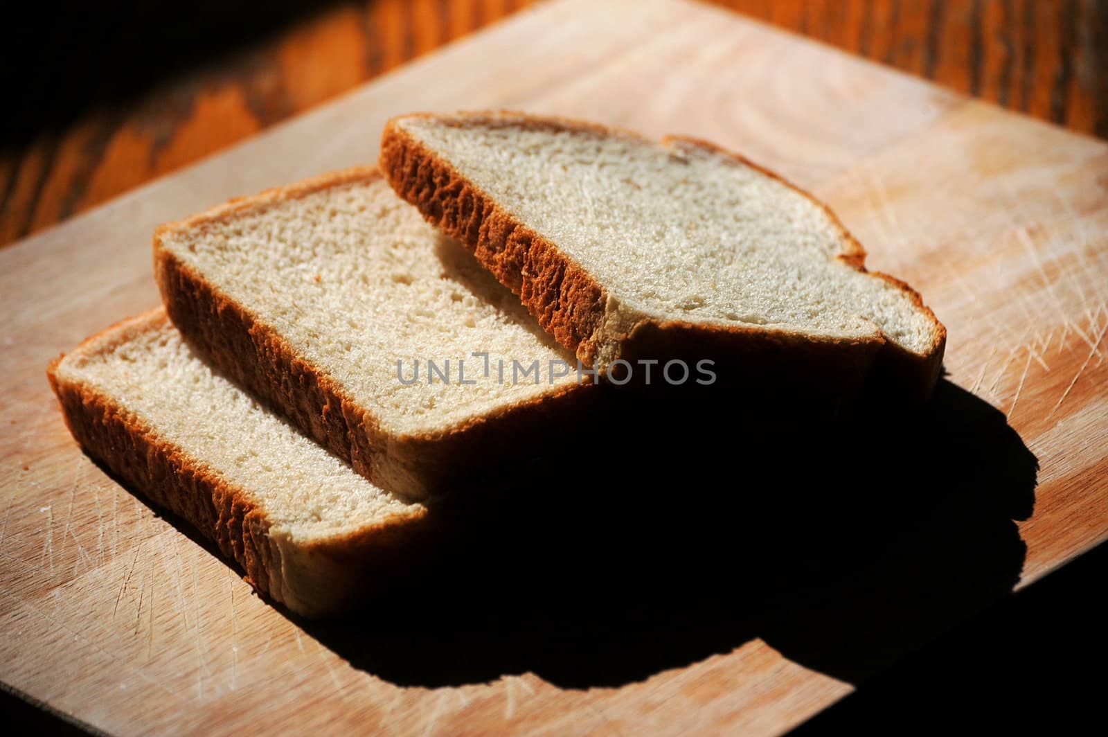 Slices of bread on a cutting board