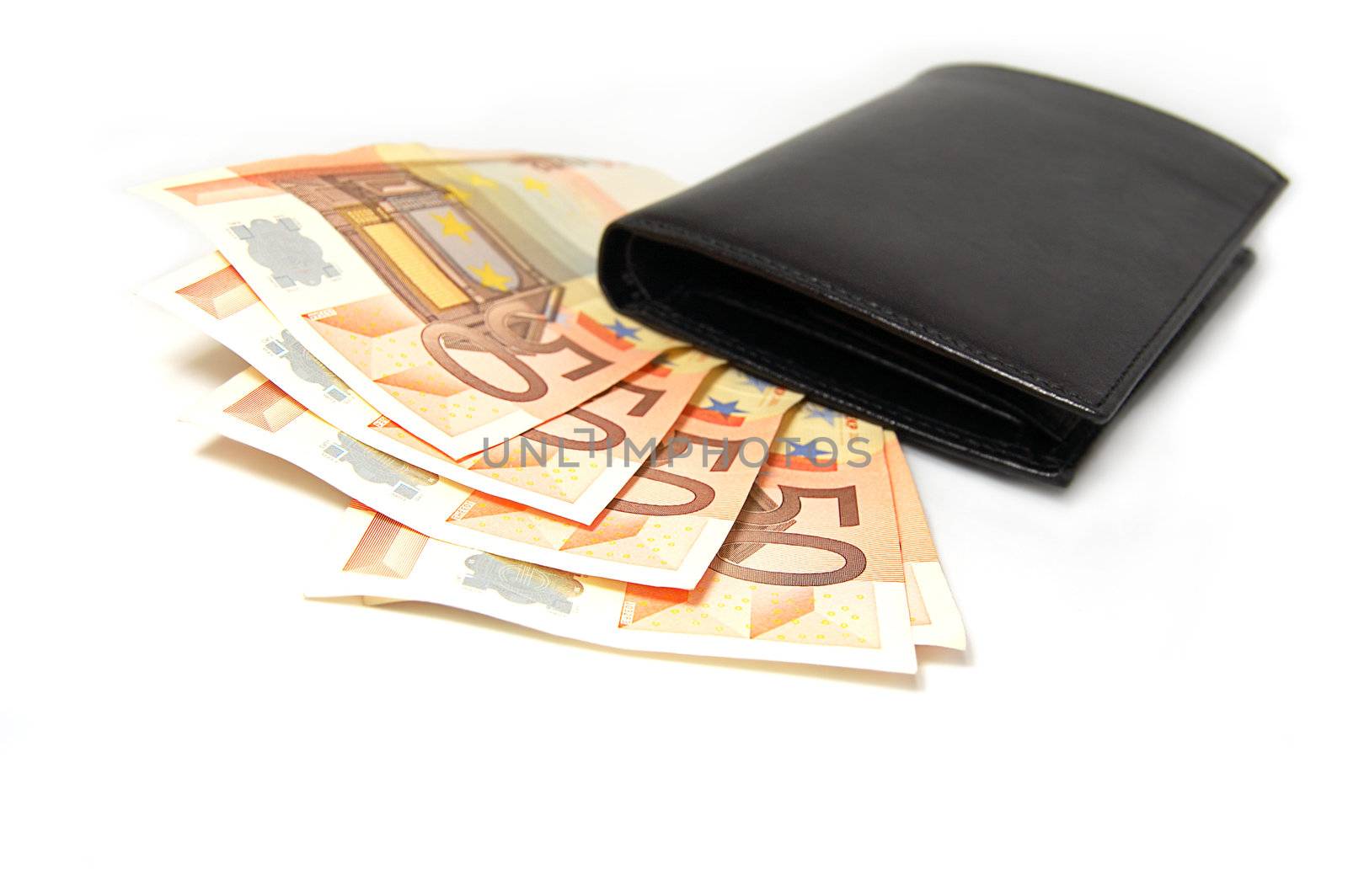 Fifty euro banknotes in leather black purse isolated on white