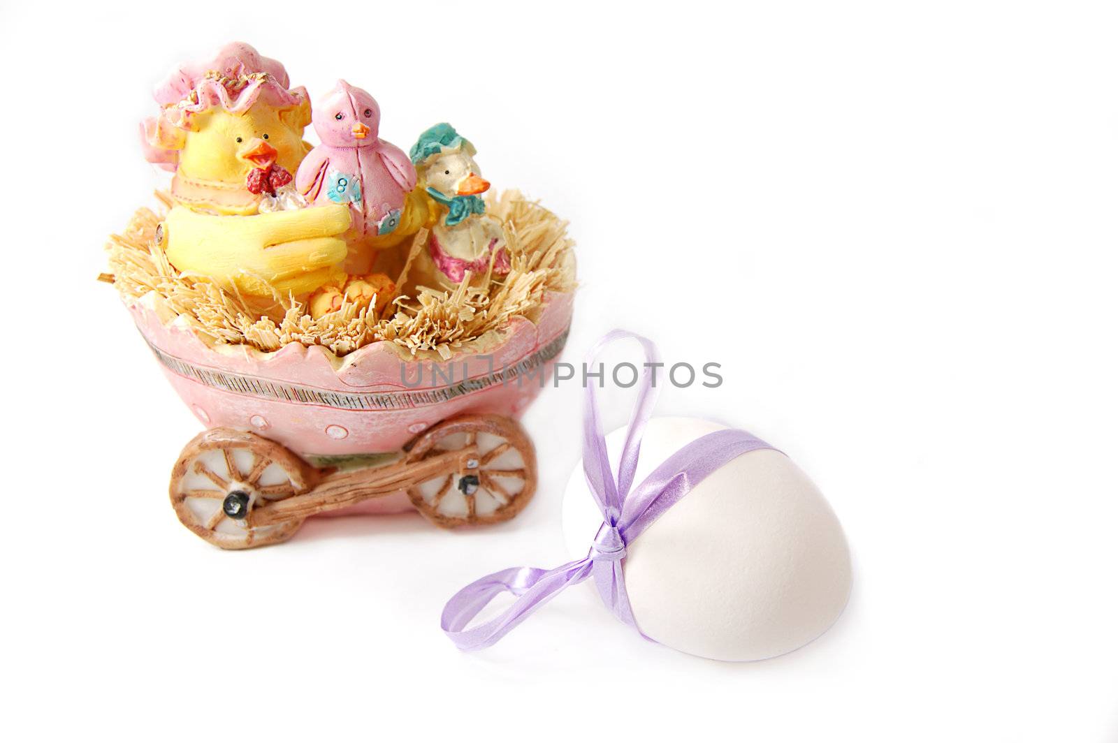 Chicken figurine and egg isolated on white