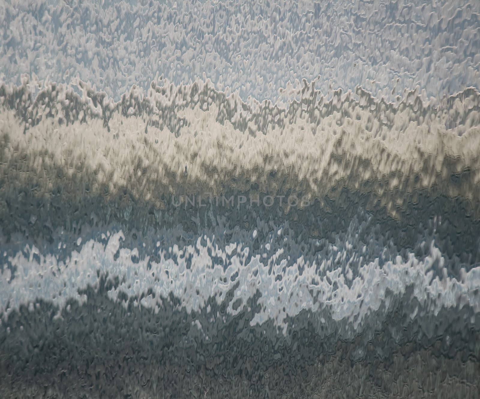 Reflection Blurred by Ripples