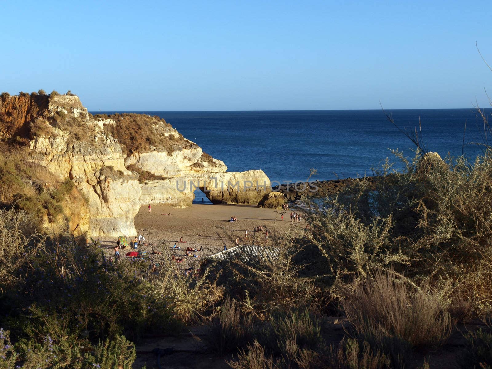 A section of the idyllic Praia de Rocha beach on the southern coast of the Portuguese Algarve region.