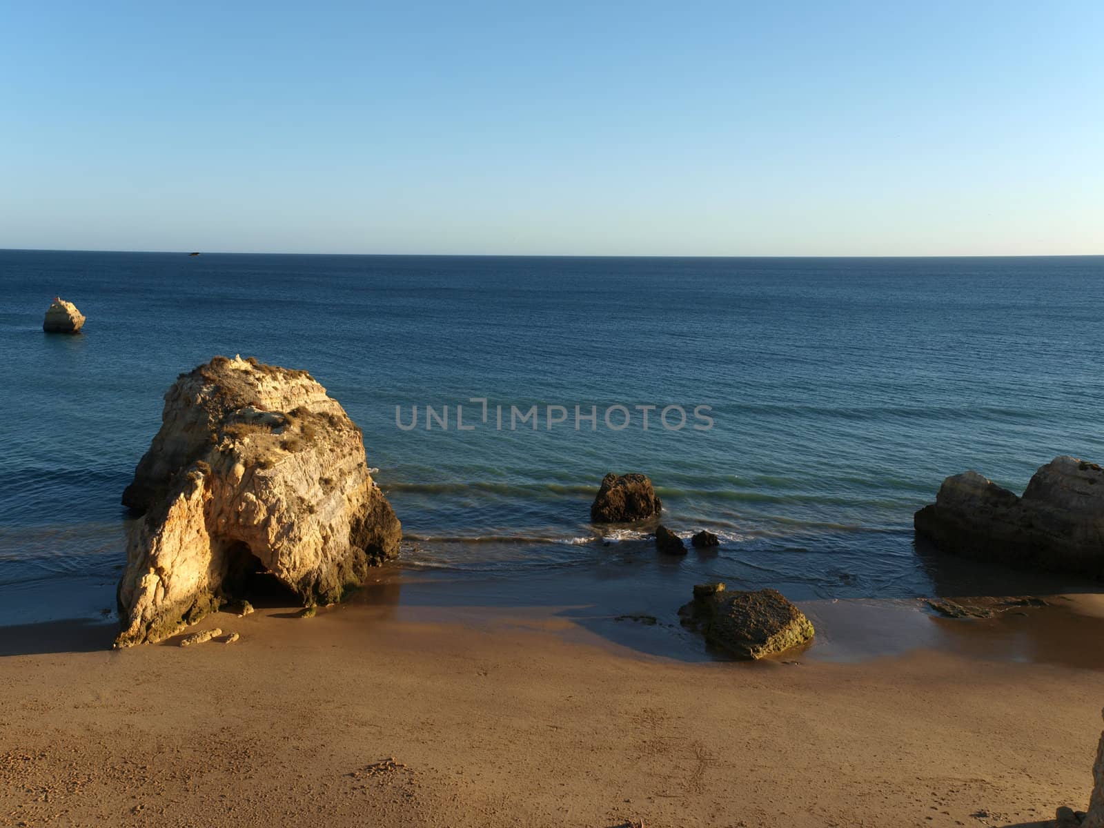 A lonely rock in the ocean. The effect of erosion