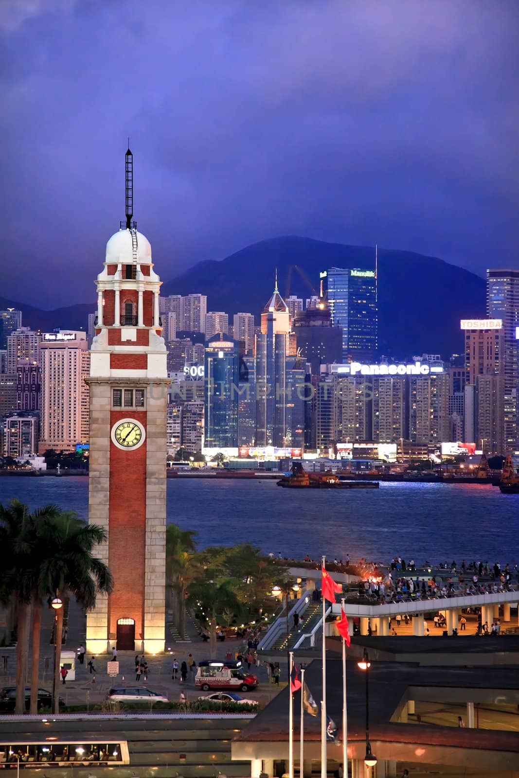 Hong Kong Clock Tower and Harbor at Night from Kowloon Star Ferry Reflection