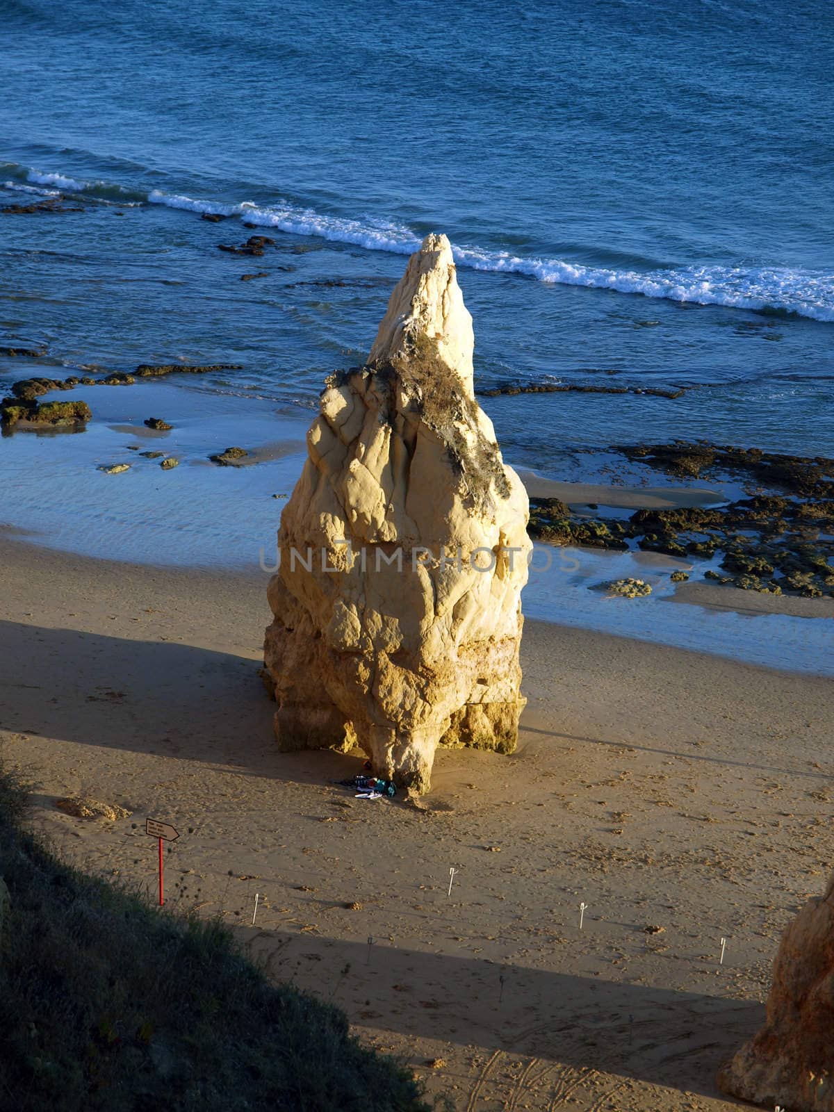 A lonely rock in the ocean. The effect of erosion