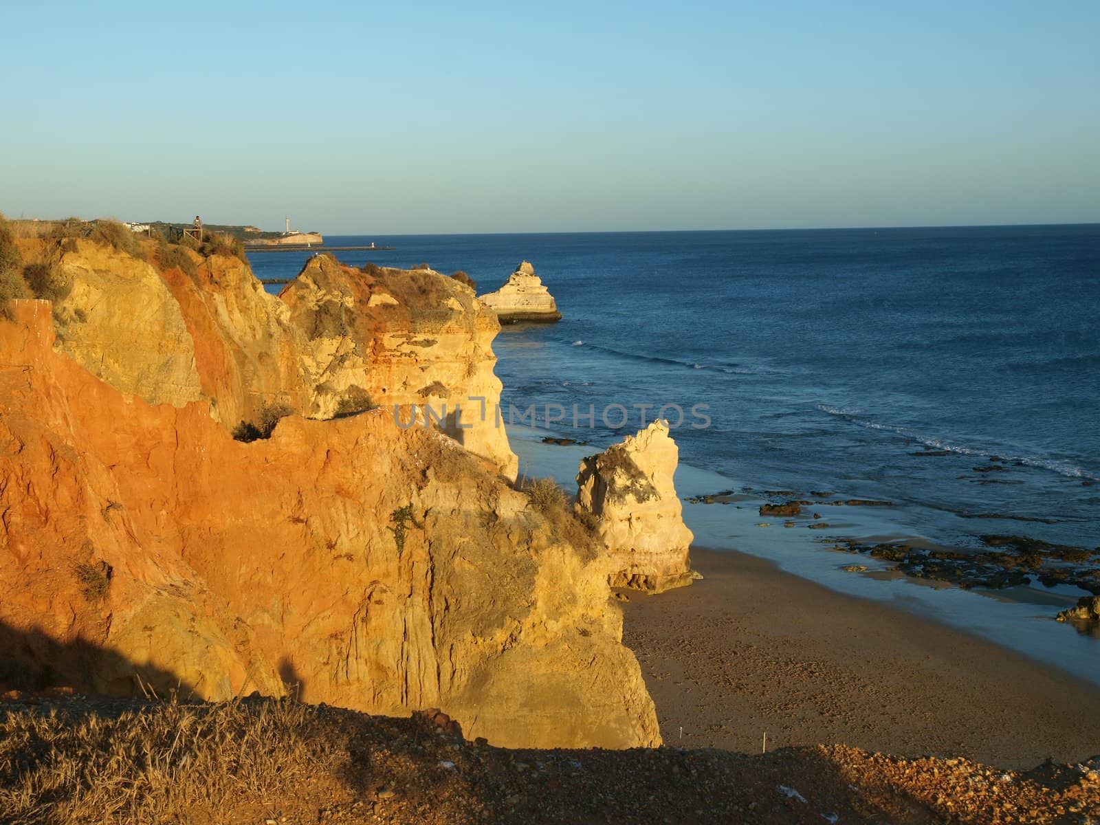 Praia da Rocha in the glow of the sunset. Portimao, Algarve