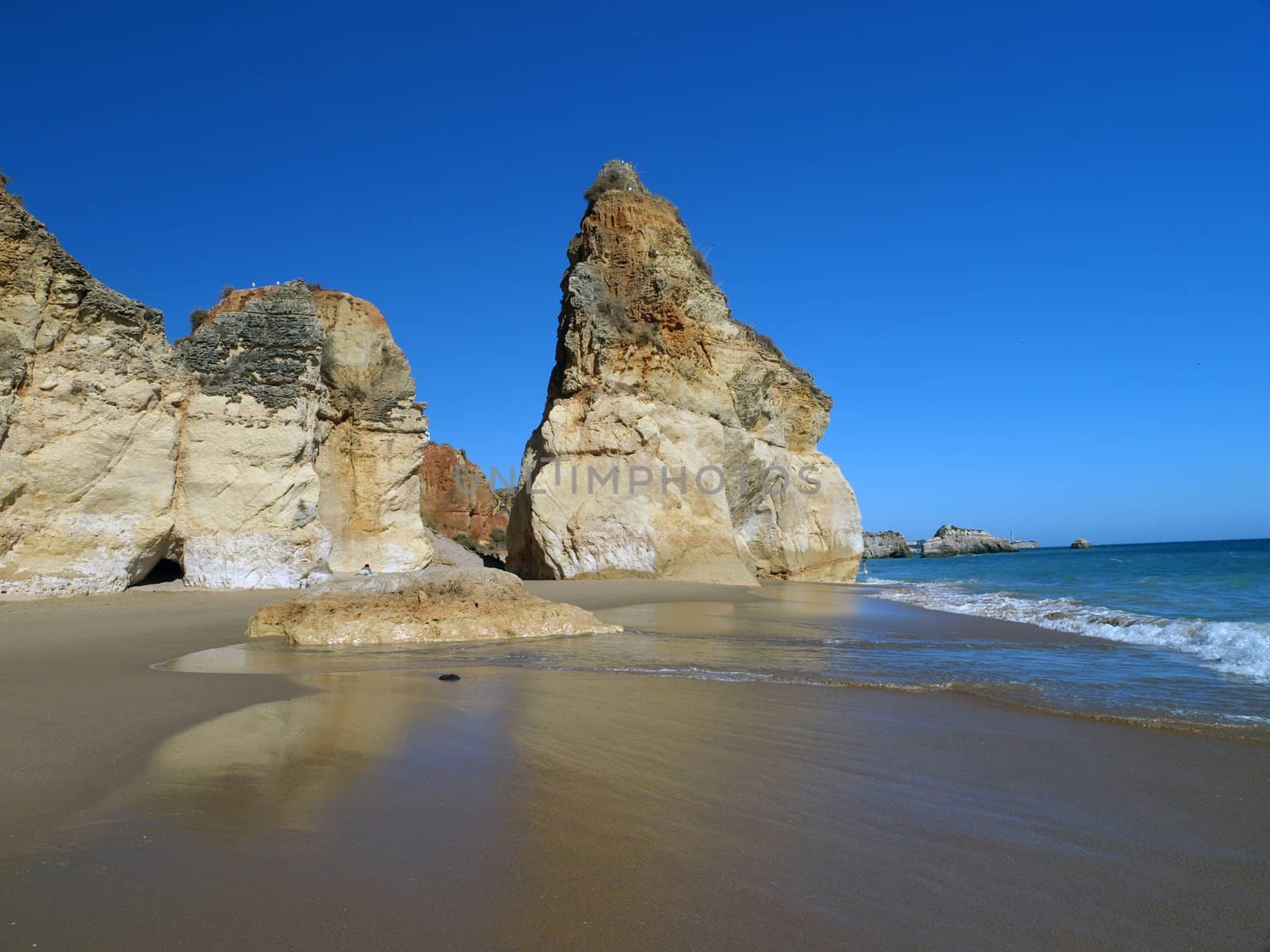 A section of the idyllic Praia de Rocha beach on the southern coast of the Portuguese Algarve region.