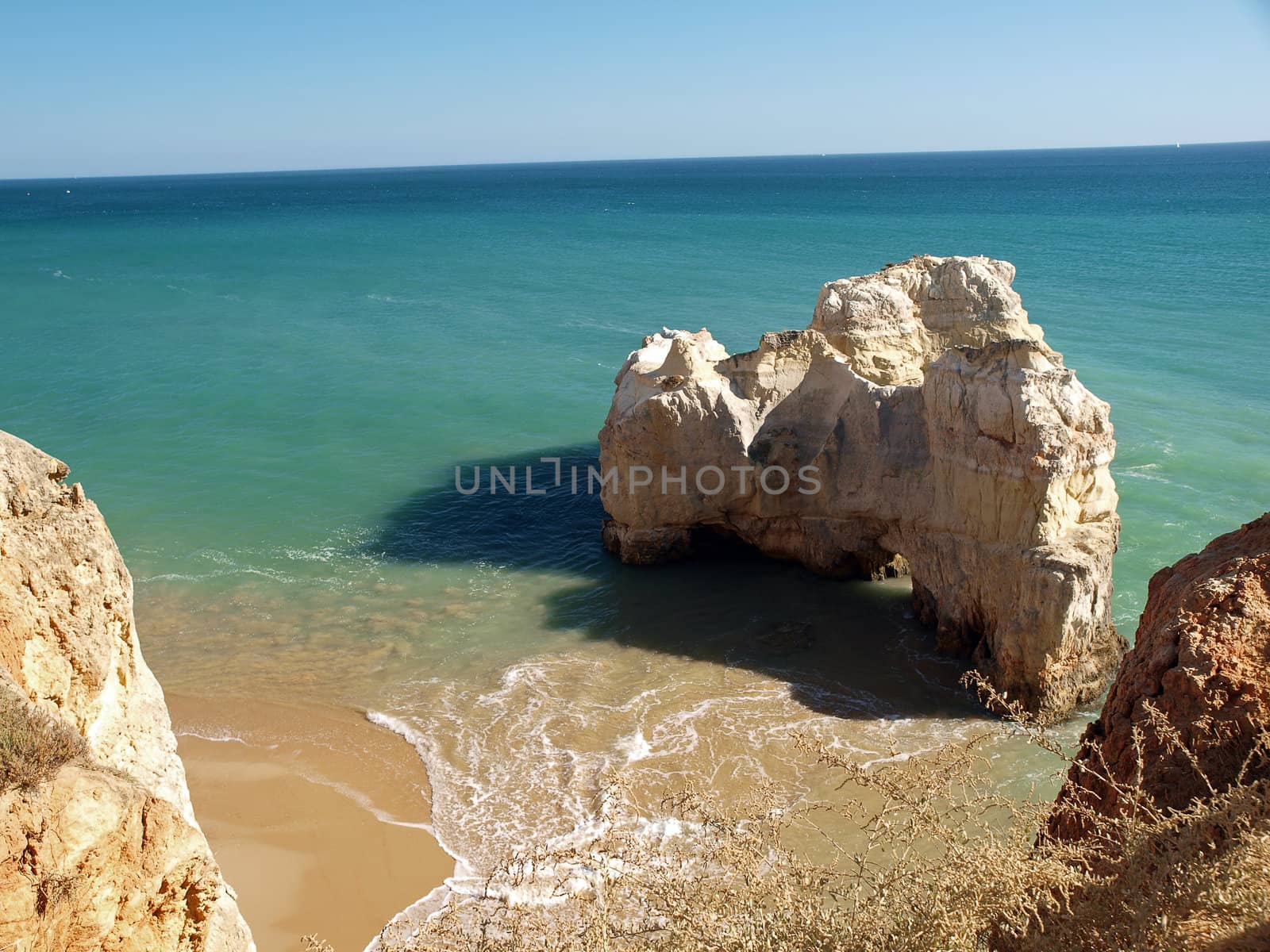 A lonely rock in the ocean. The effect of erosion