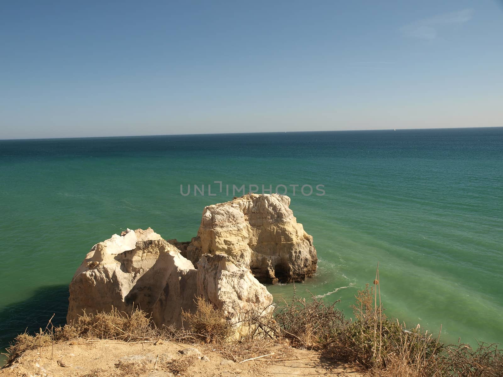 A lonely rock in the ocean. The effect of erosion