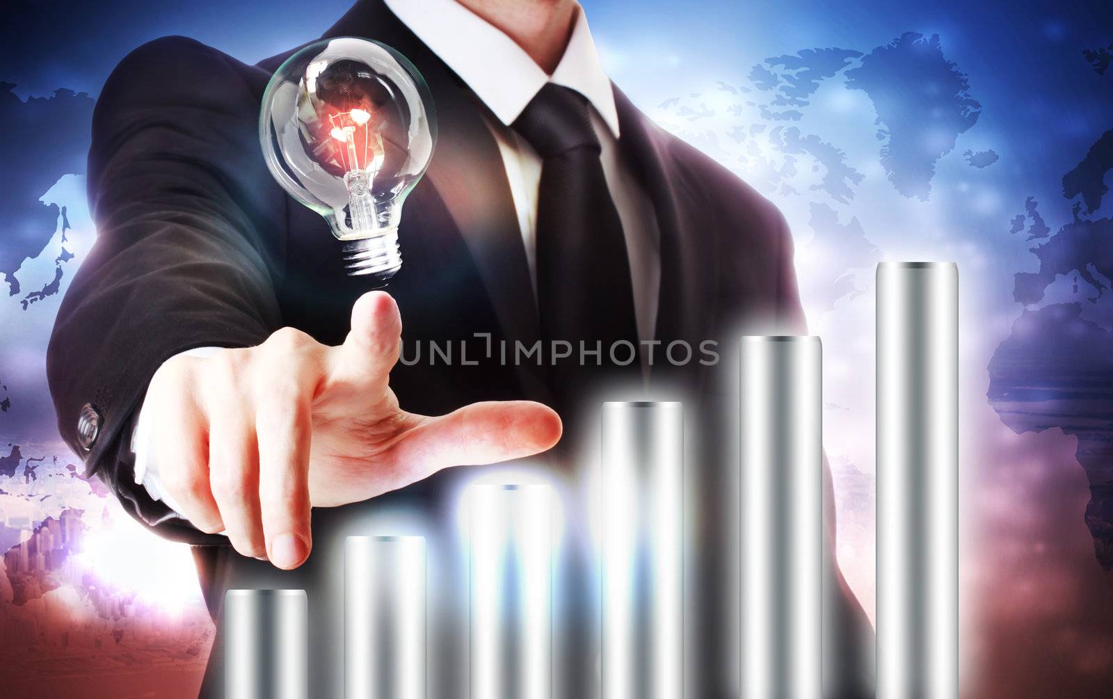 Businessman with a graph representing growth and a light bulb with global map background