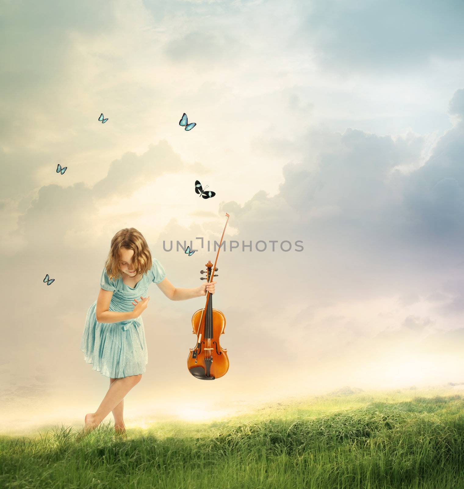 Little girl with a violin in a fantasy landscape with butterflies 