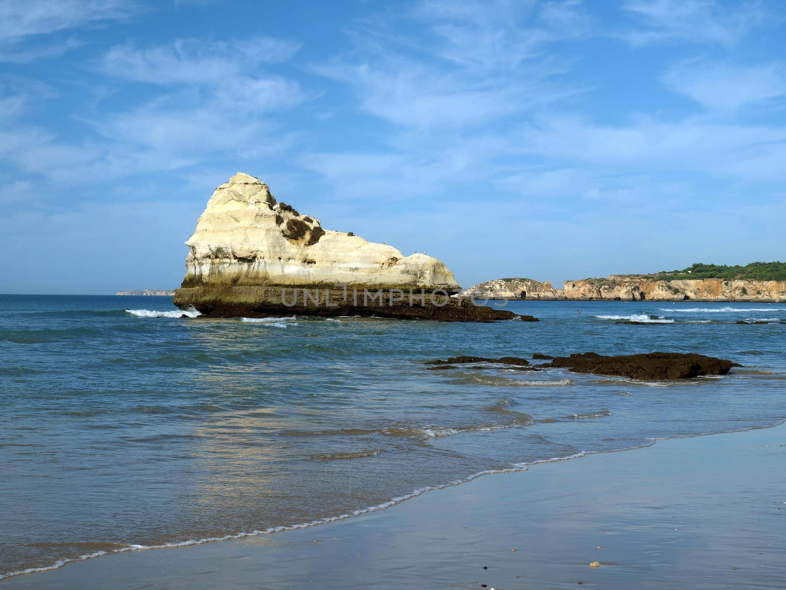 A lonely rock in the ocean. The effect of erosion