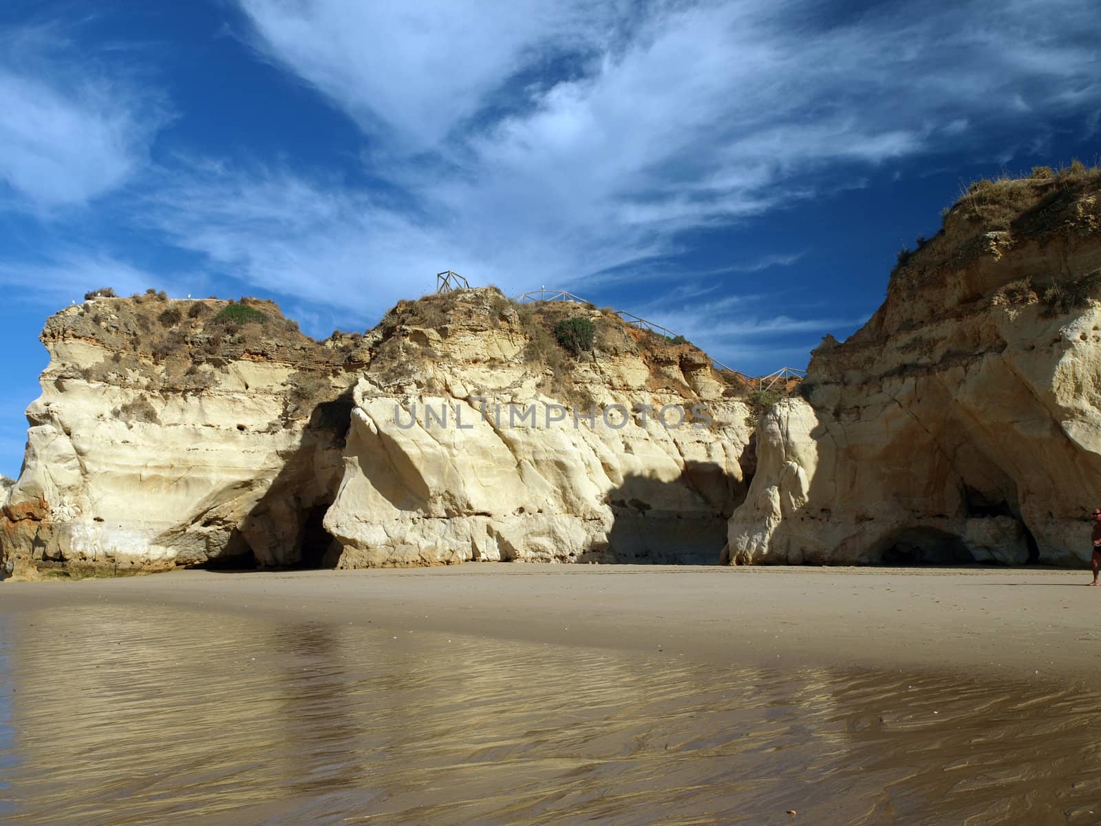 Caves and colourful rock formations on the Algarve coast in Portugal 