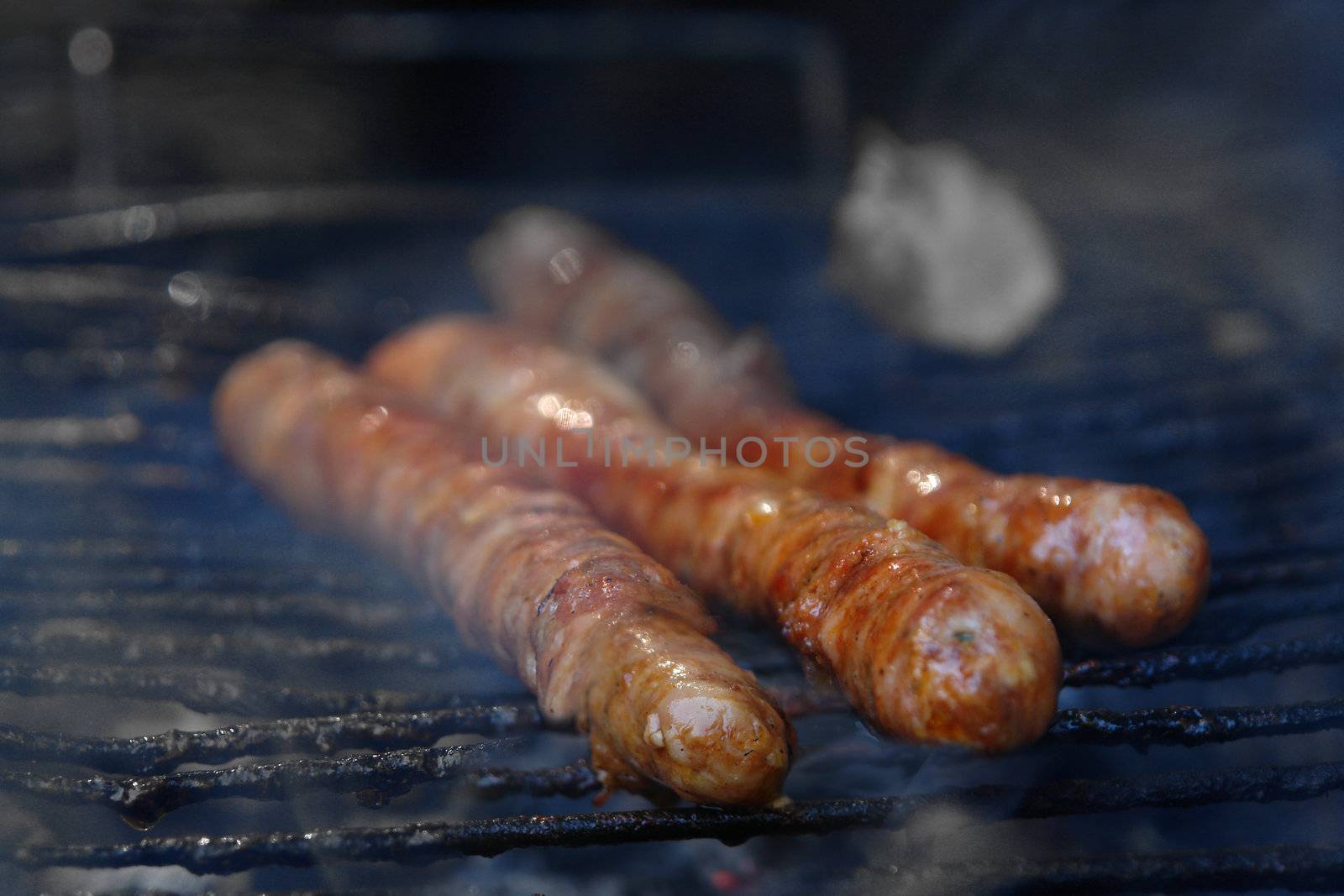 grilling outdoors on a wood barbecue grill.