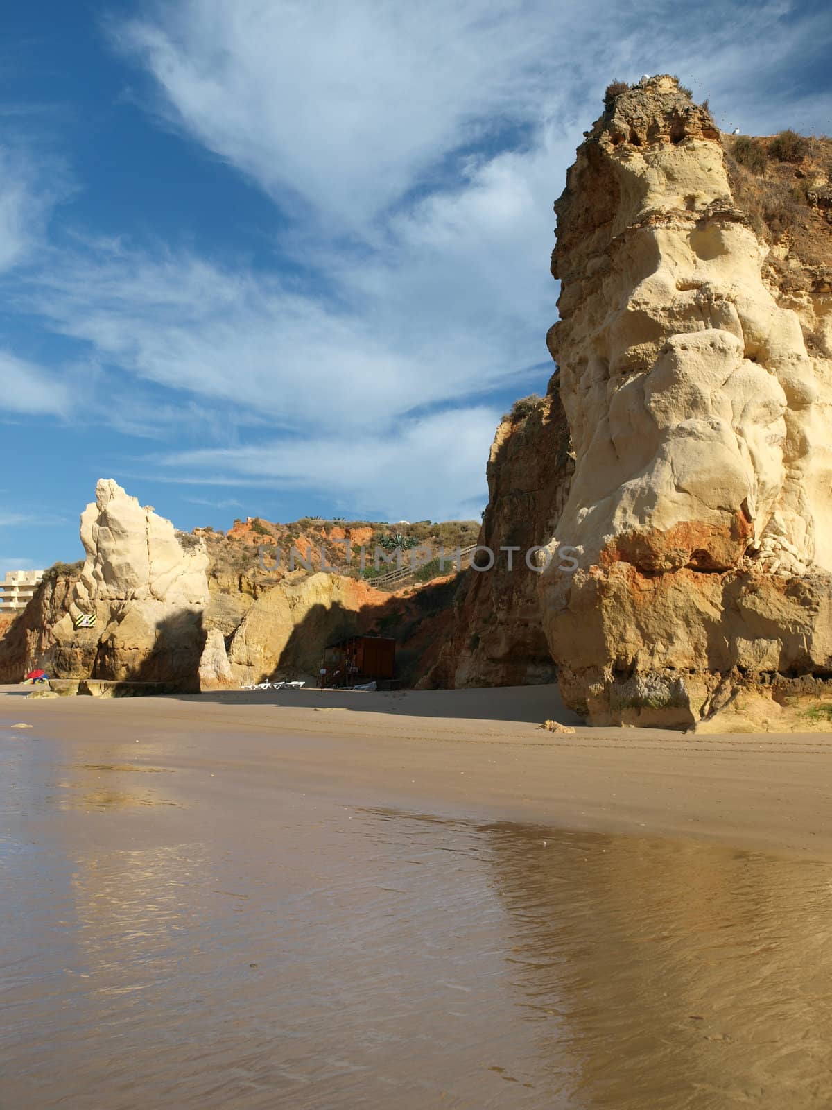 Caves and colourful rock formations on the Algarve coast in Portugal 