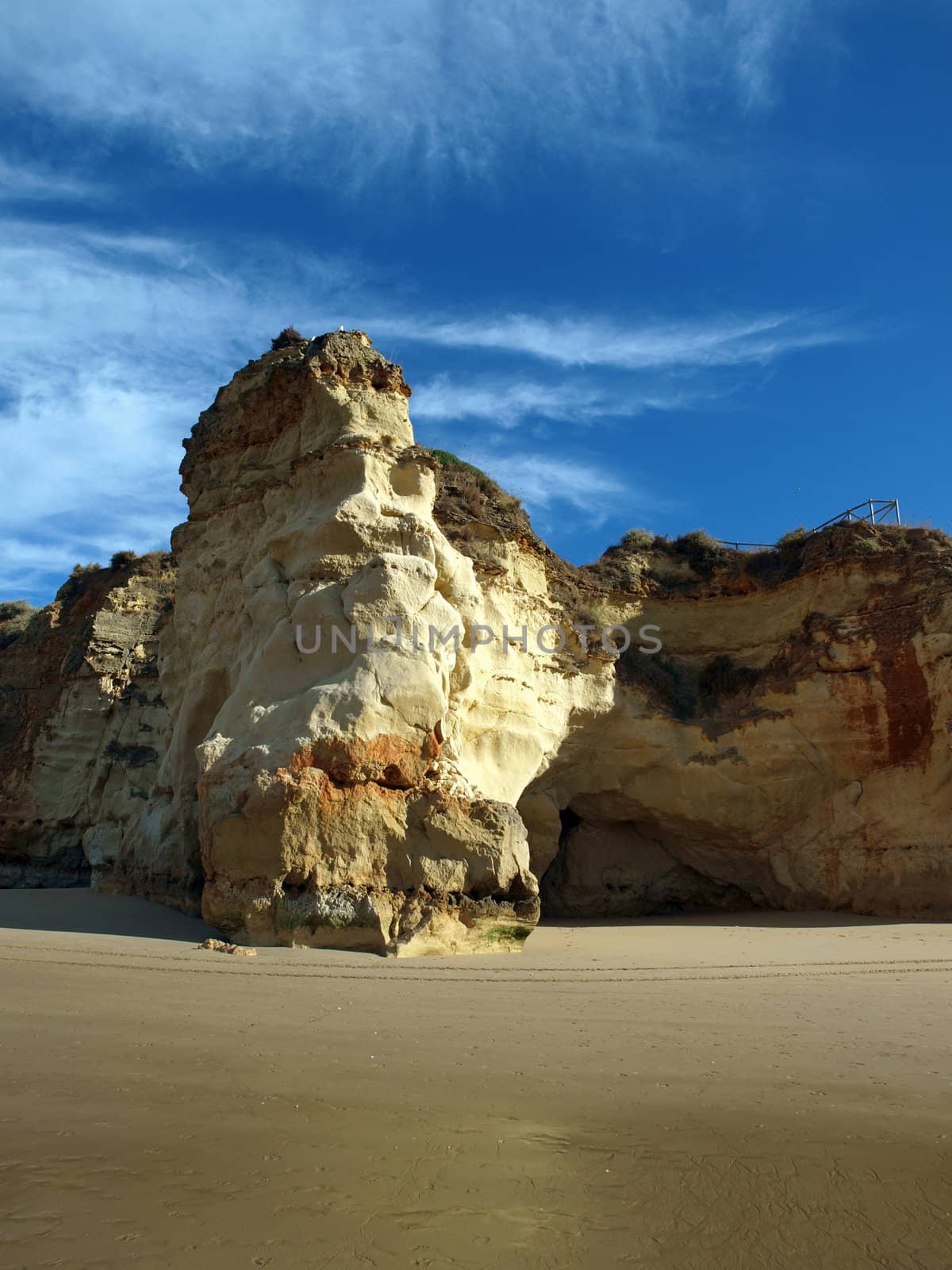 A section of the idyllic Praia de Rocha beach on the southern coast of the Portuguese Algarve region.