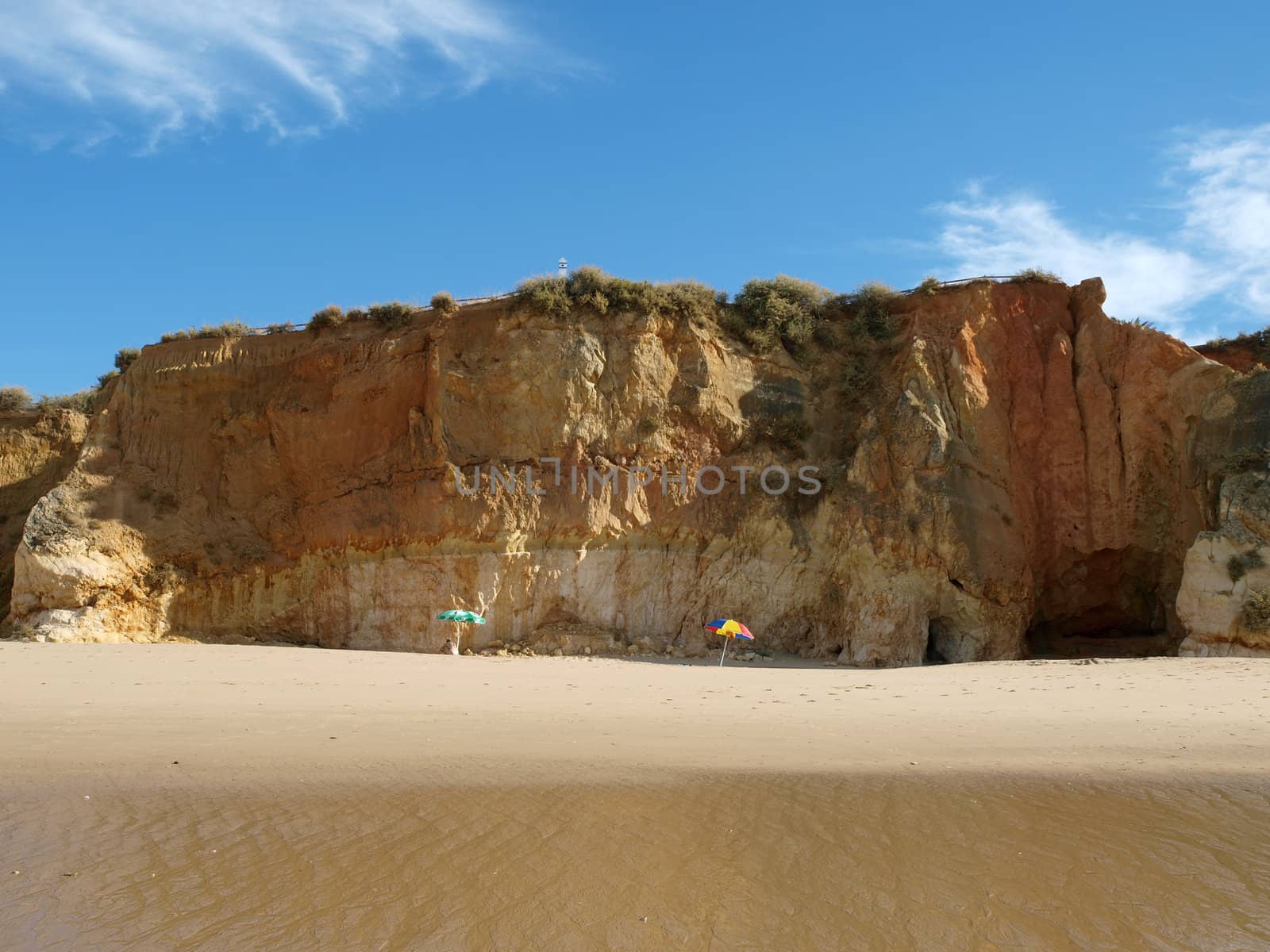 A section of the idyllic Praia de Rocha beach on the southern coast of the Portuguese Algarve region.