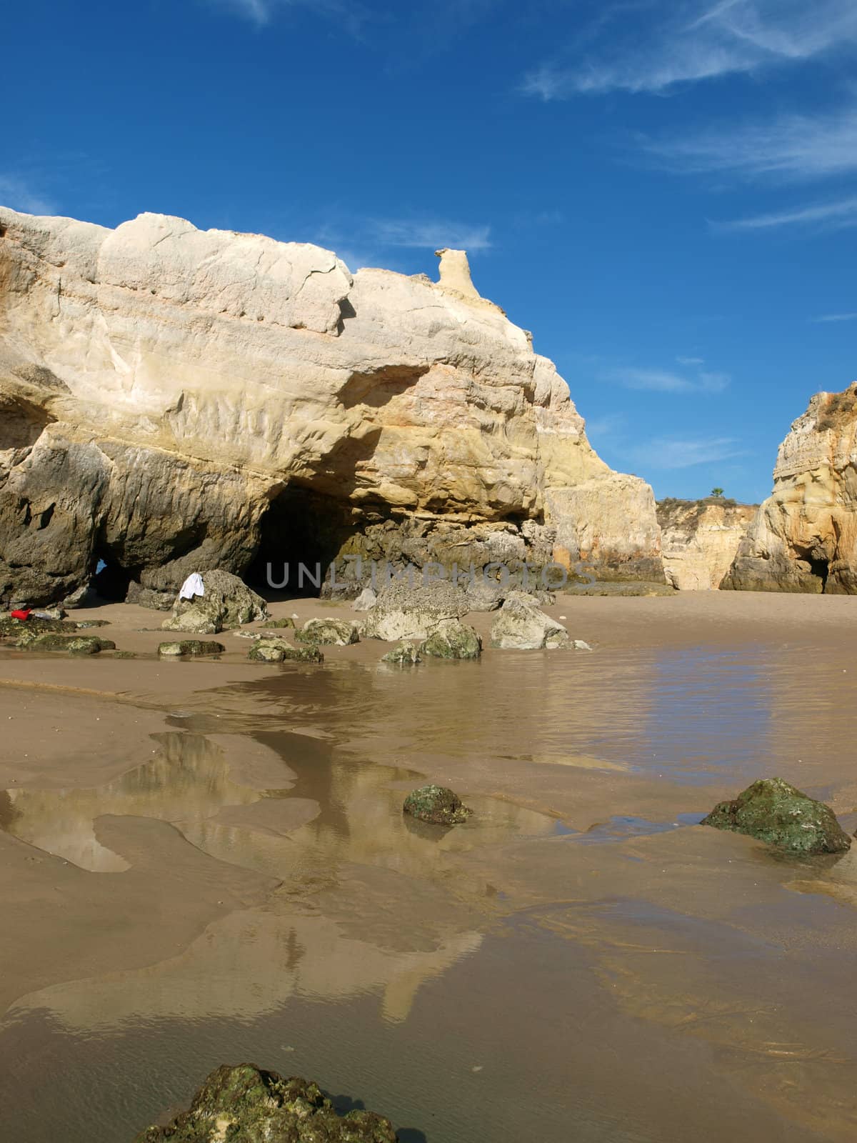 Caves and colourful rock formations on the Algarve coast in Portugal