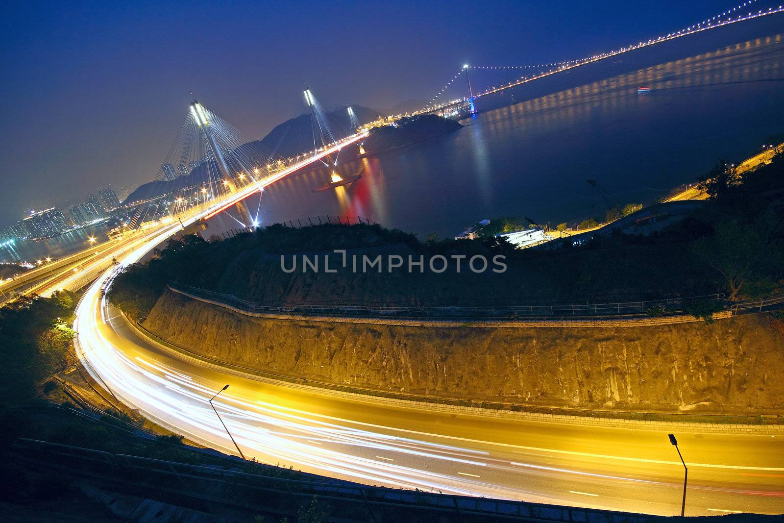 Hong Kong Bridge of transportation at night  by cozyta
