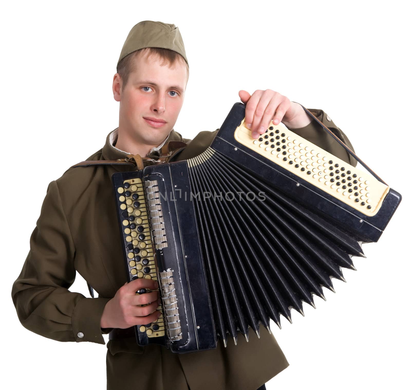 A soldier plays the accordion. Isolated on white background