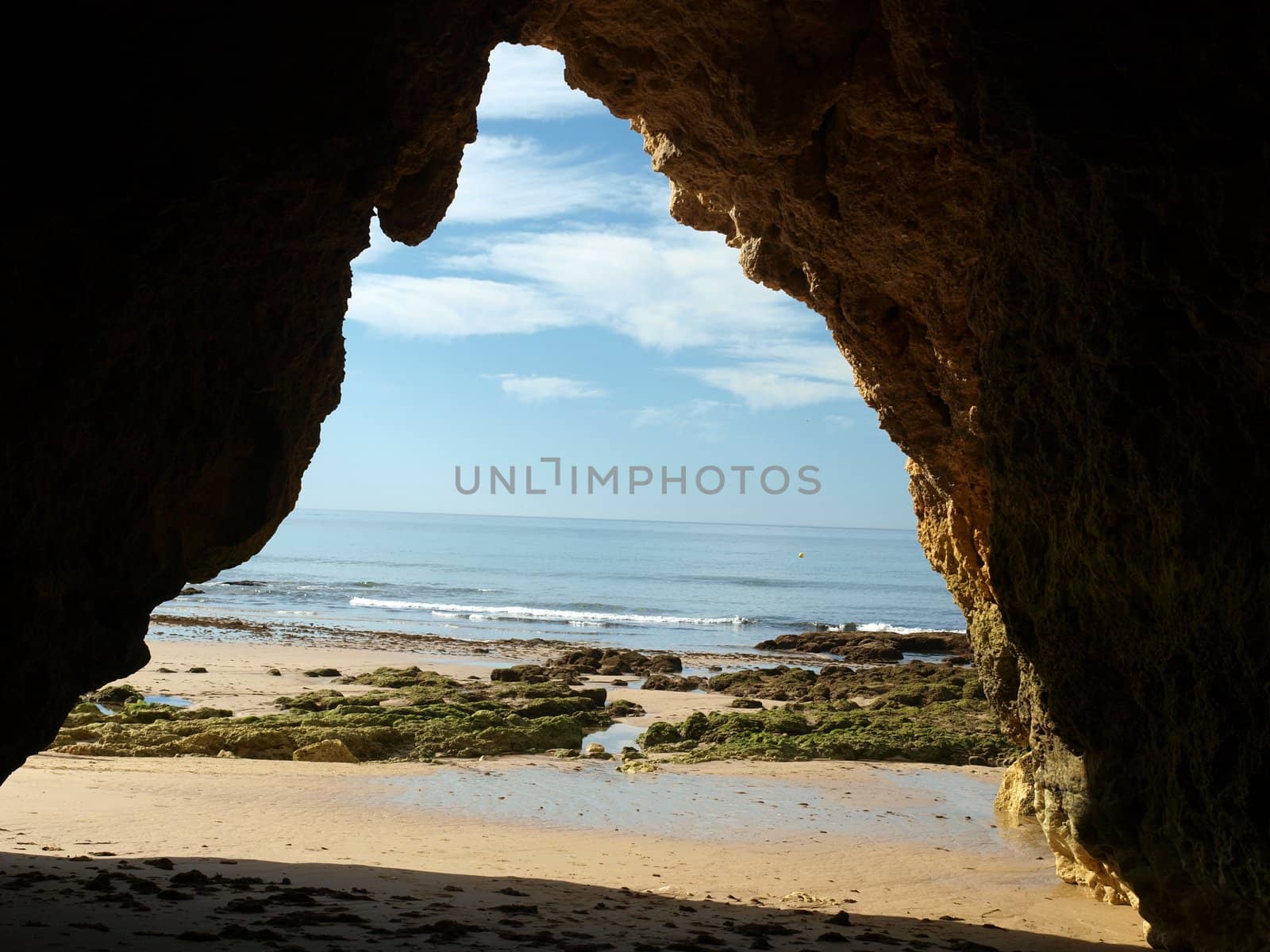 Caves and colourful rock formations on the Algarve coast in Portugal