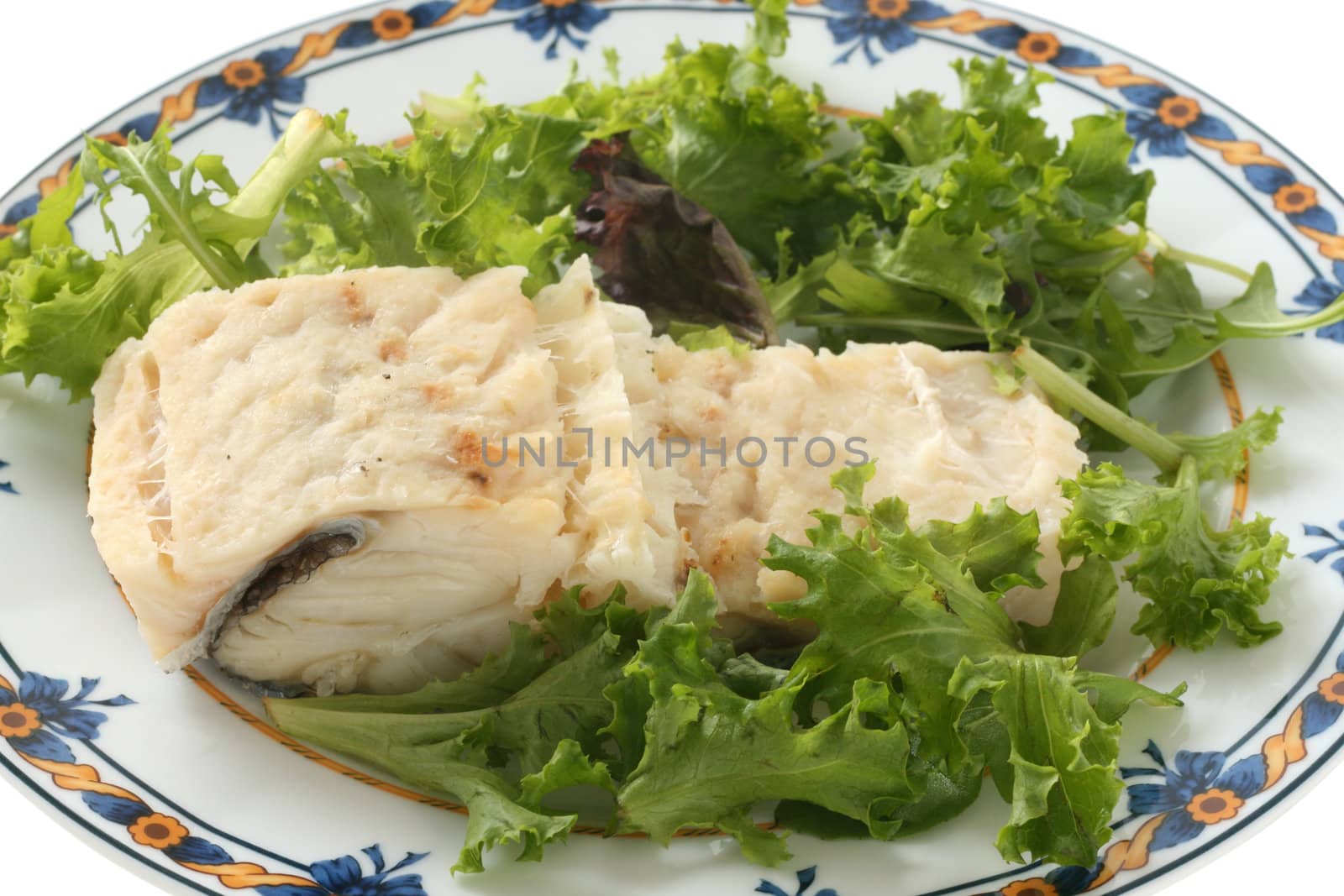 Boiled codfish with salad