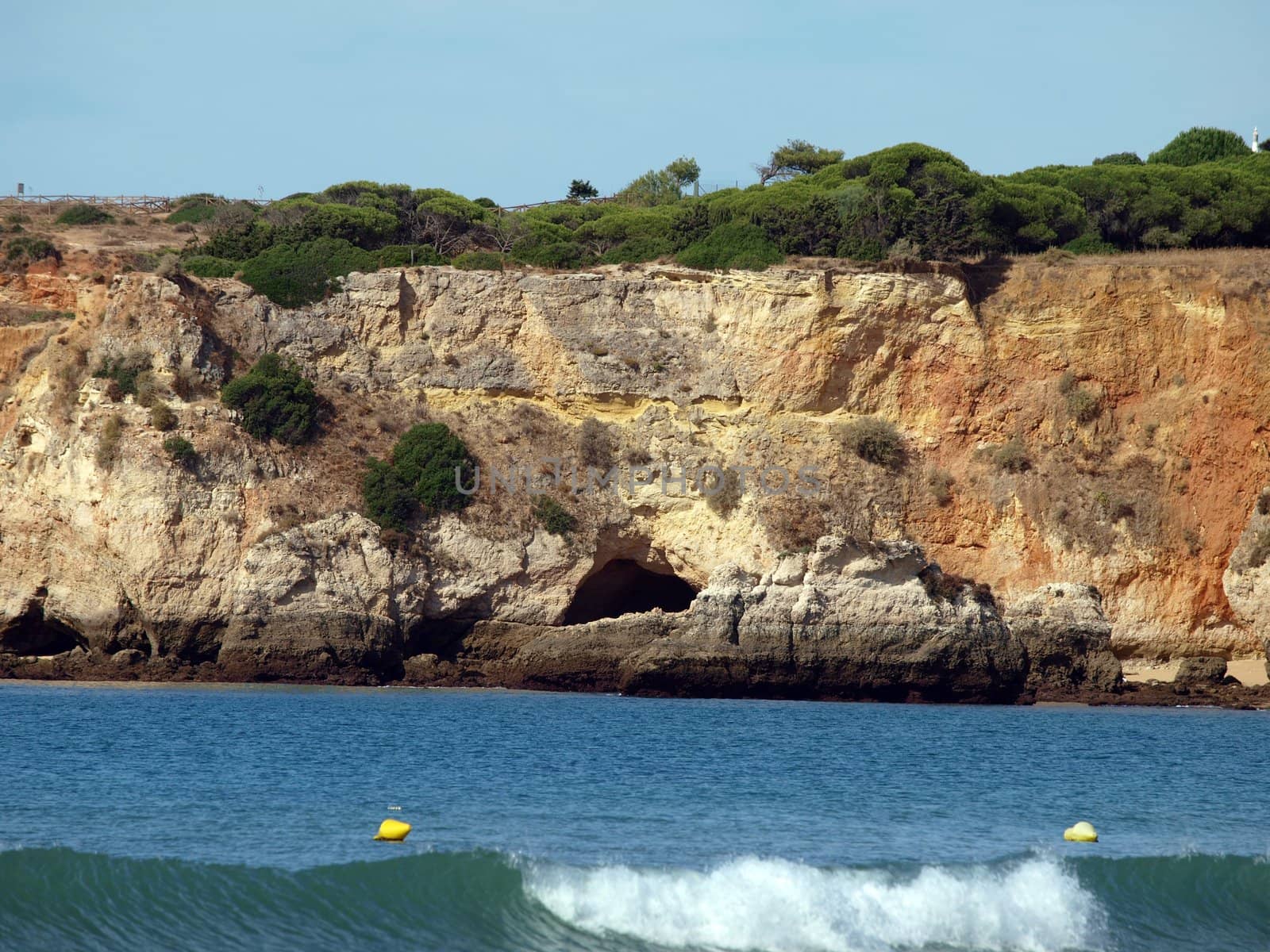 Caves and colourful rock formations on the Algarve coast in Portugal