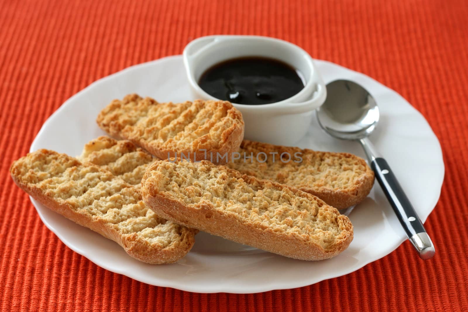 toasts with jam on plate by nataliamylova