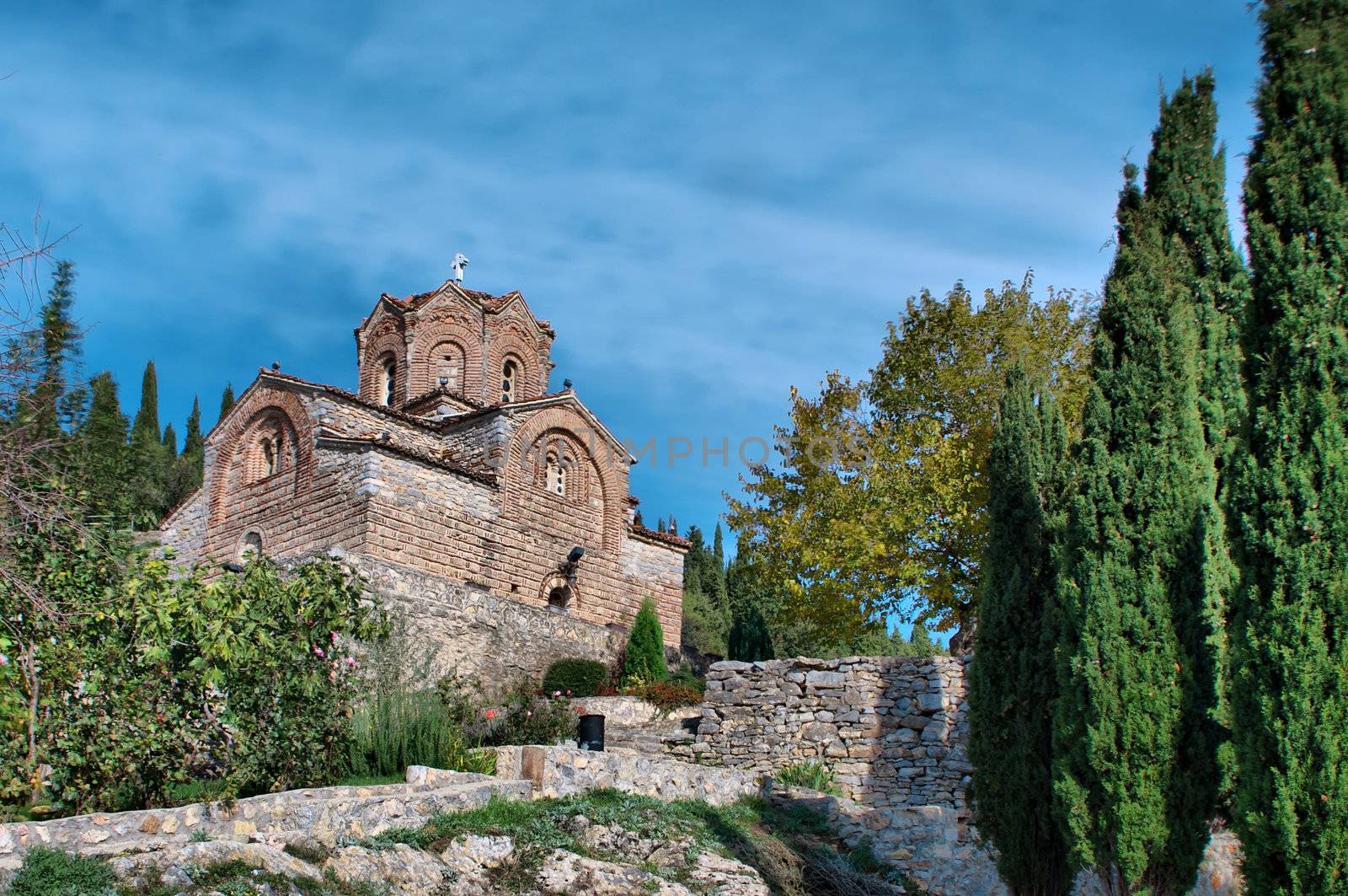 old ancient church St. John / Jovan Kaneo lower view at lake Ohrid, Macedonia between the trees