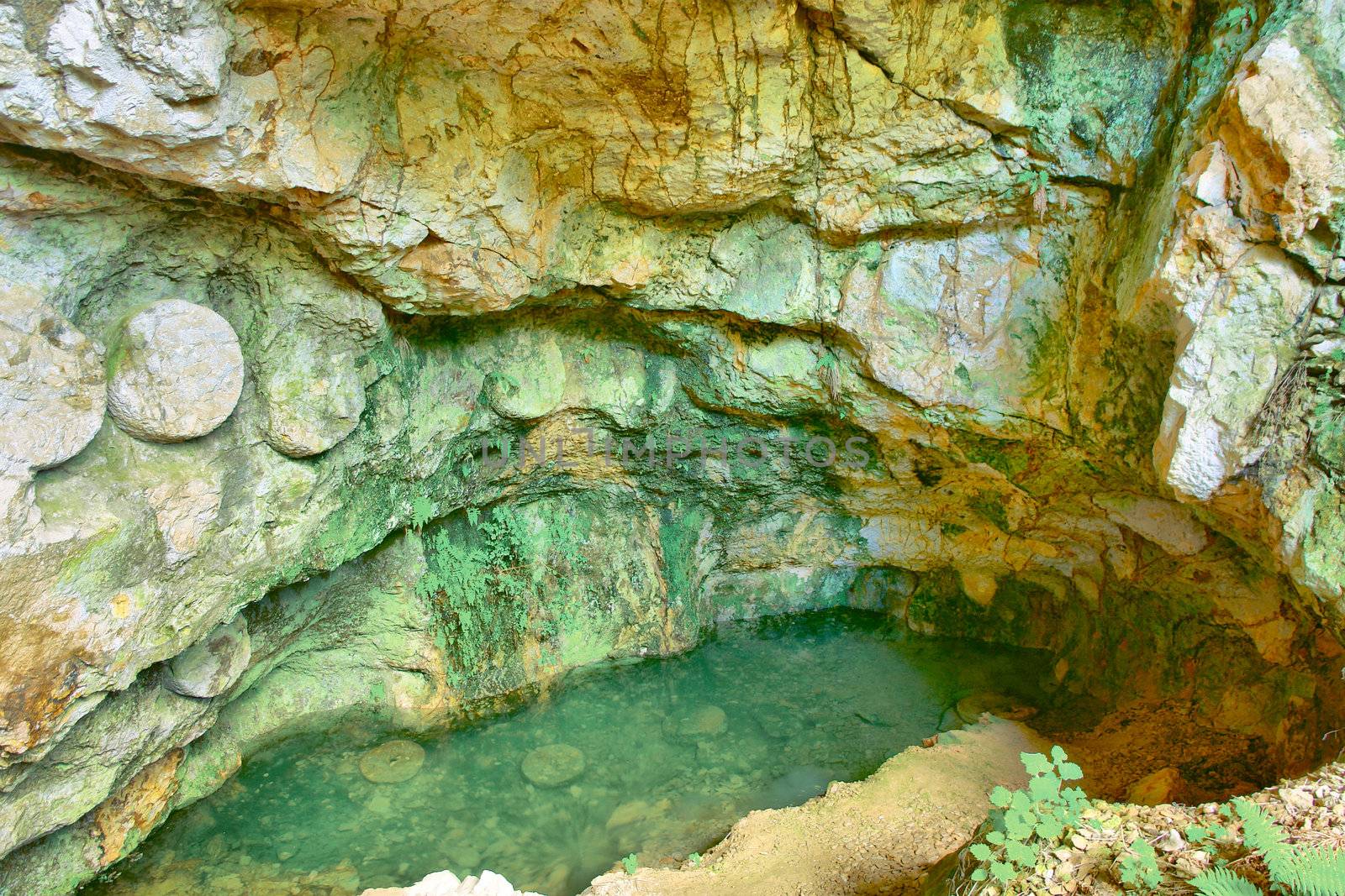 Colorful cave formations in Macedonia. Circle stones made for the sawmills.