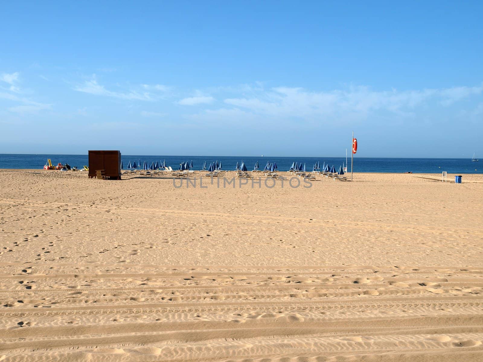A section of the idyllic Praia de Rocha beach on the southern coast of the Portuguese Algarve region.